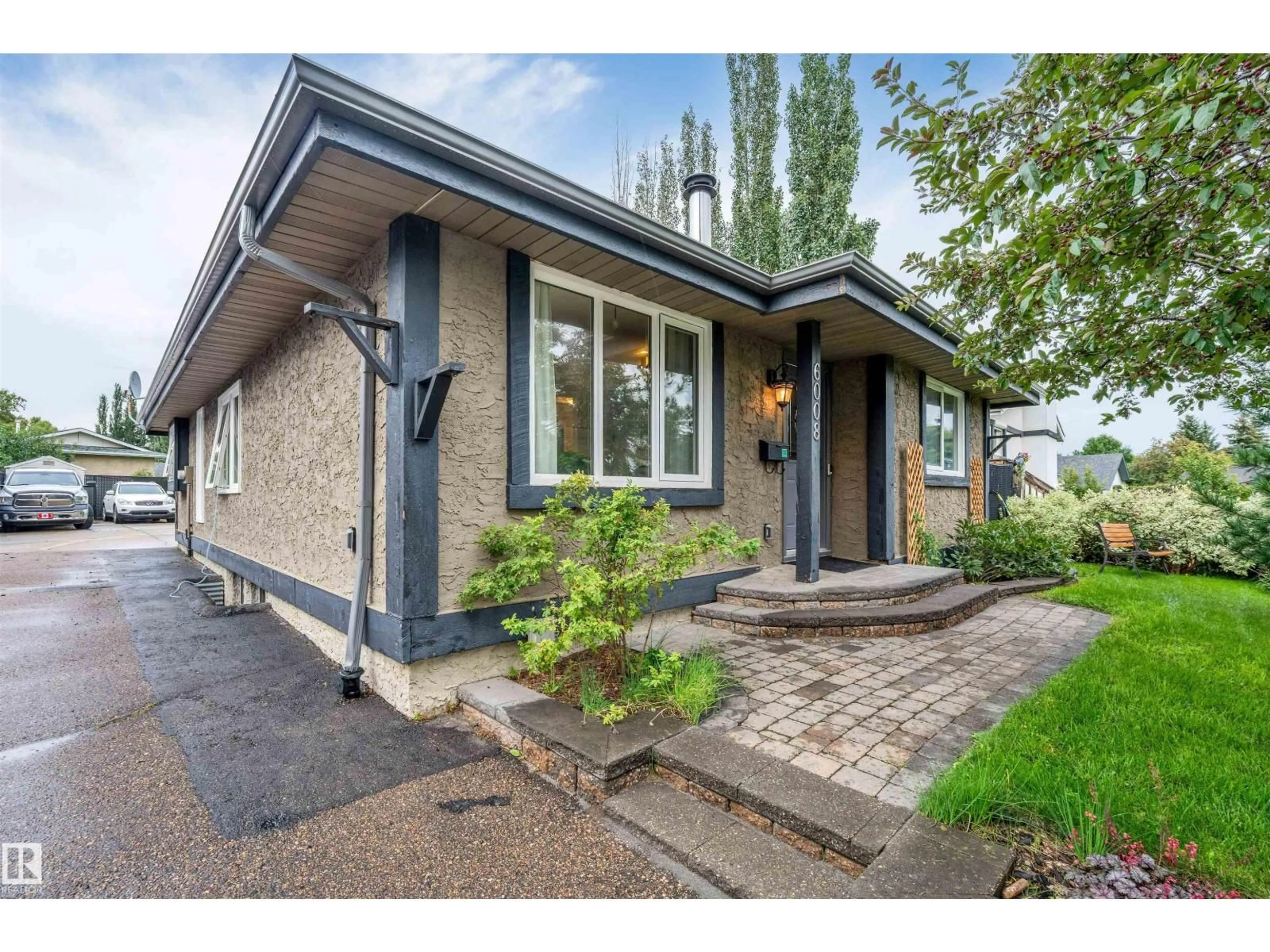 Home with brick exterior material, street for 6008 37 AV, Edmonton Alberta T6L1H2