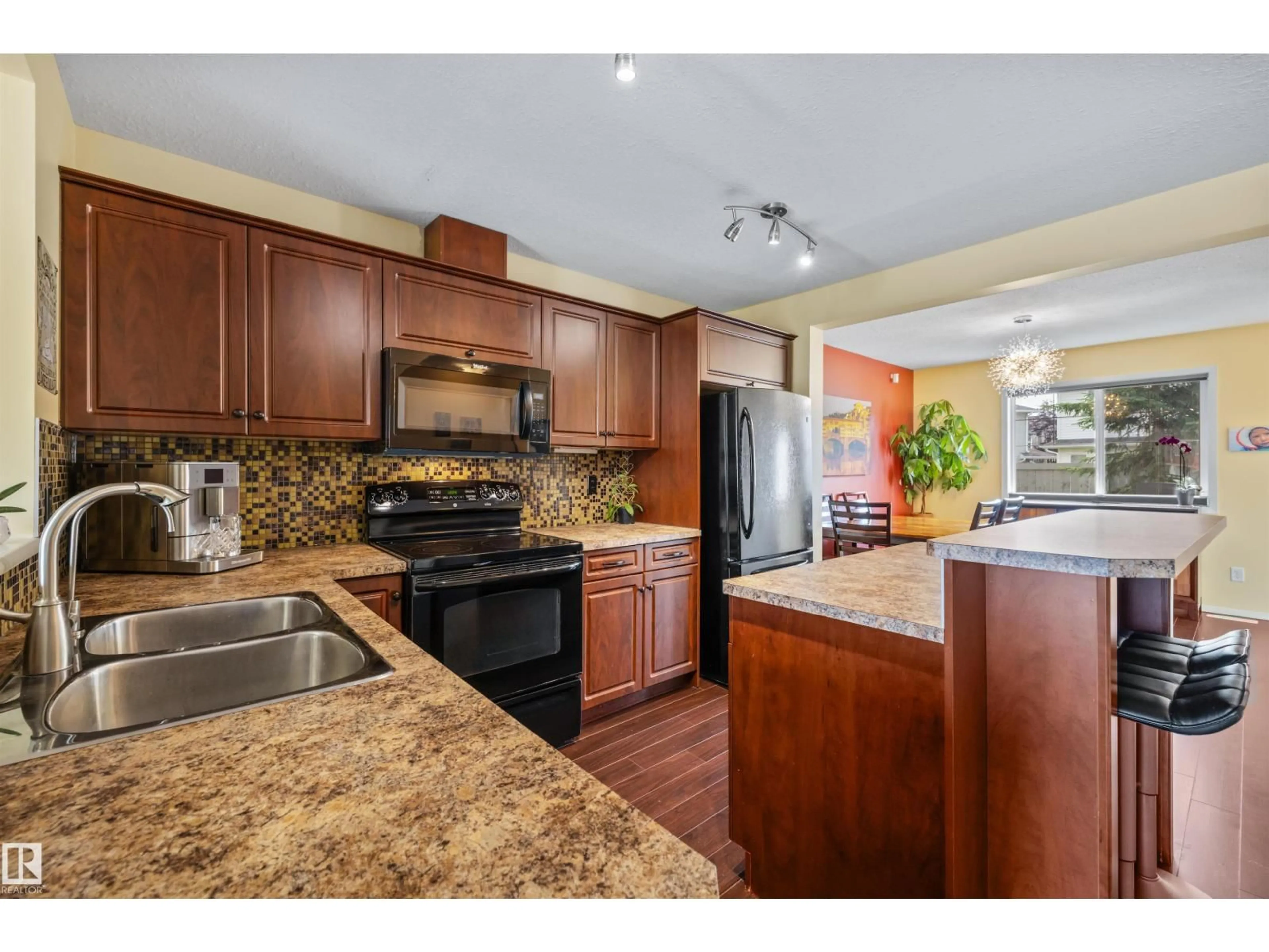 Open concept kitchen, ceramic/tile floor for 20 3751 12 ST NW, Edmonton Alberta T6T0N3