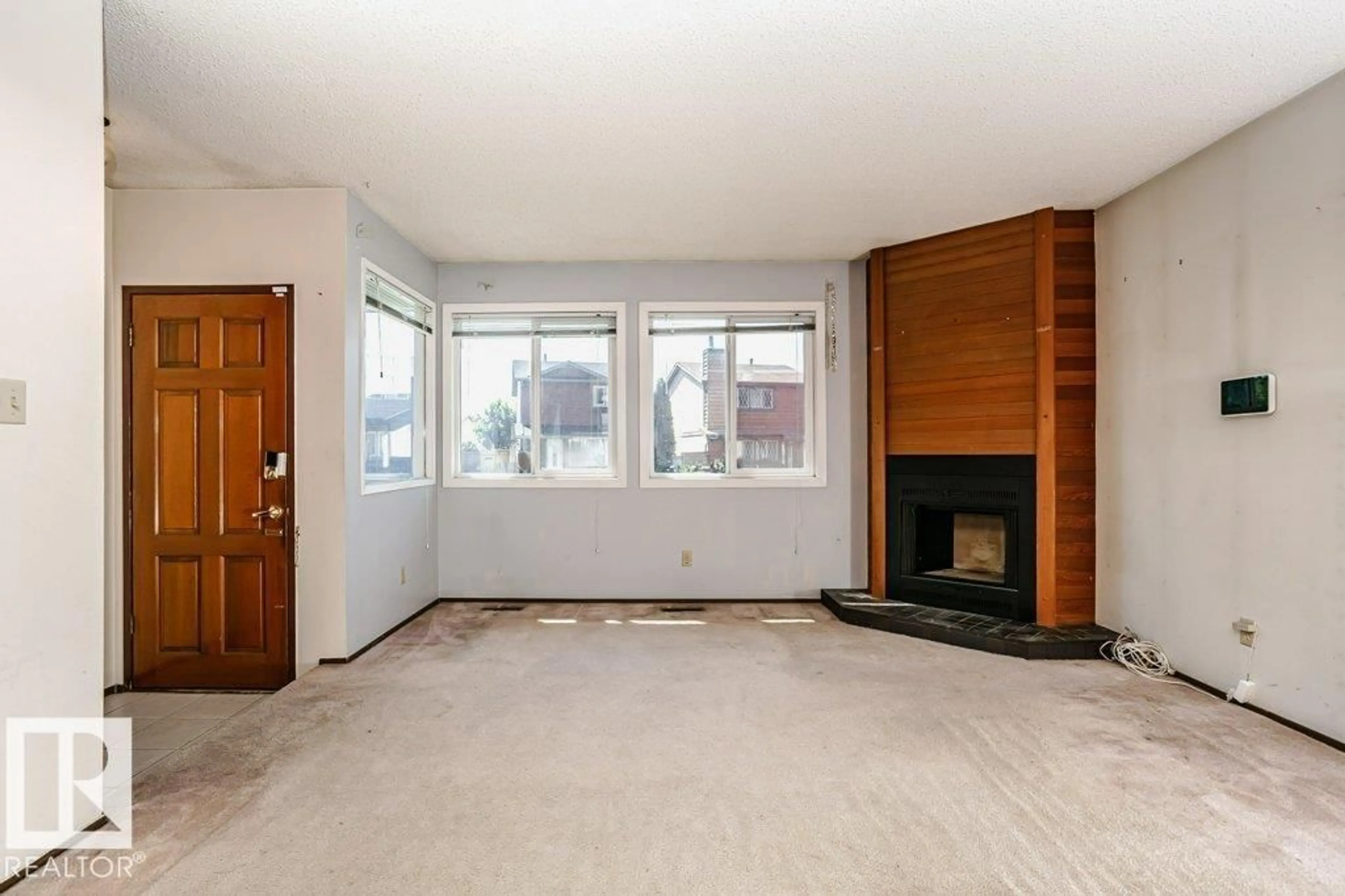Living room with furniture, unknown for 3520 42 AV, Edmonton Alberta T6L5C8