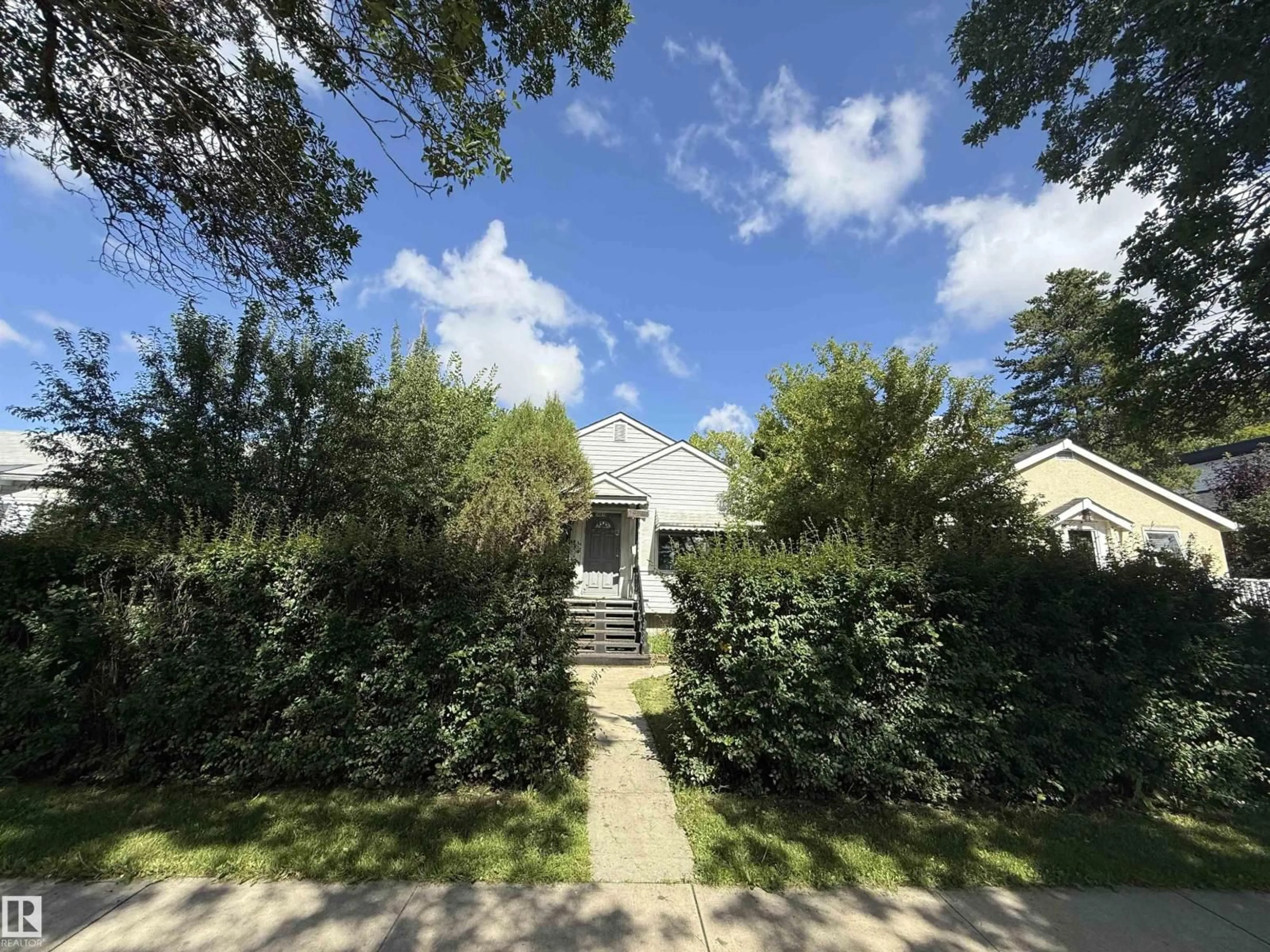 A pic from outside/outdoor area/front of a property/back of a property/a pic from drone, street for 14810 104 AV, Edmonton Alberta T5N0X7