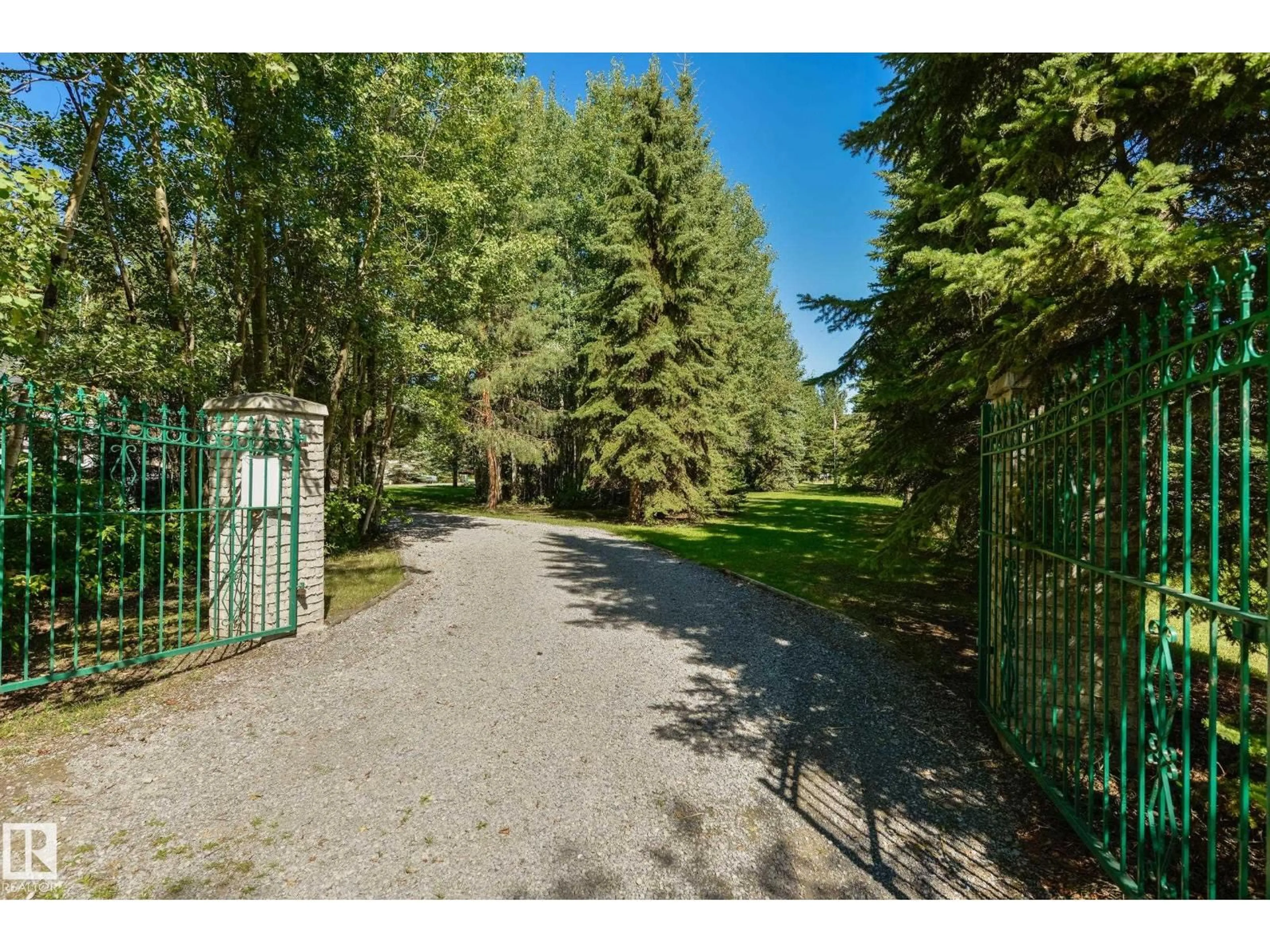 A pic from outside/outdoor area/front of a property/back of a property/a pic from drone, forest/trees view for 31 - 20 53123 HWY, Rural Parkland County Alberta T0E2B0