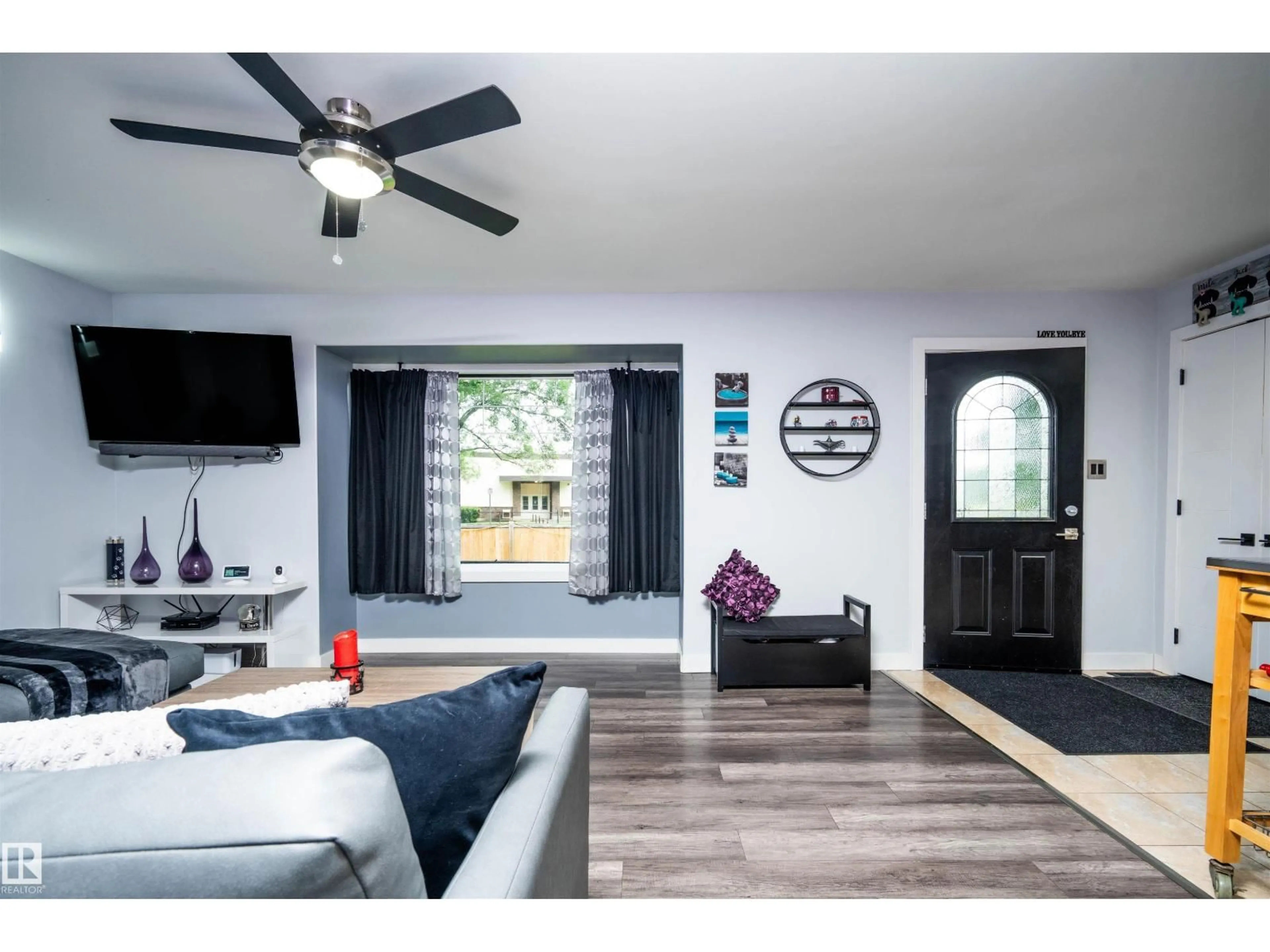 Living room with furniture, unknown for 6111 119 AV, Edmonton Alberta T5W1J7