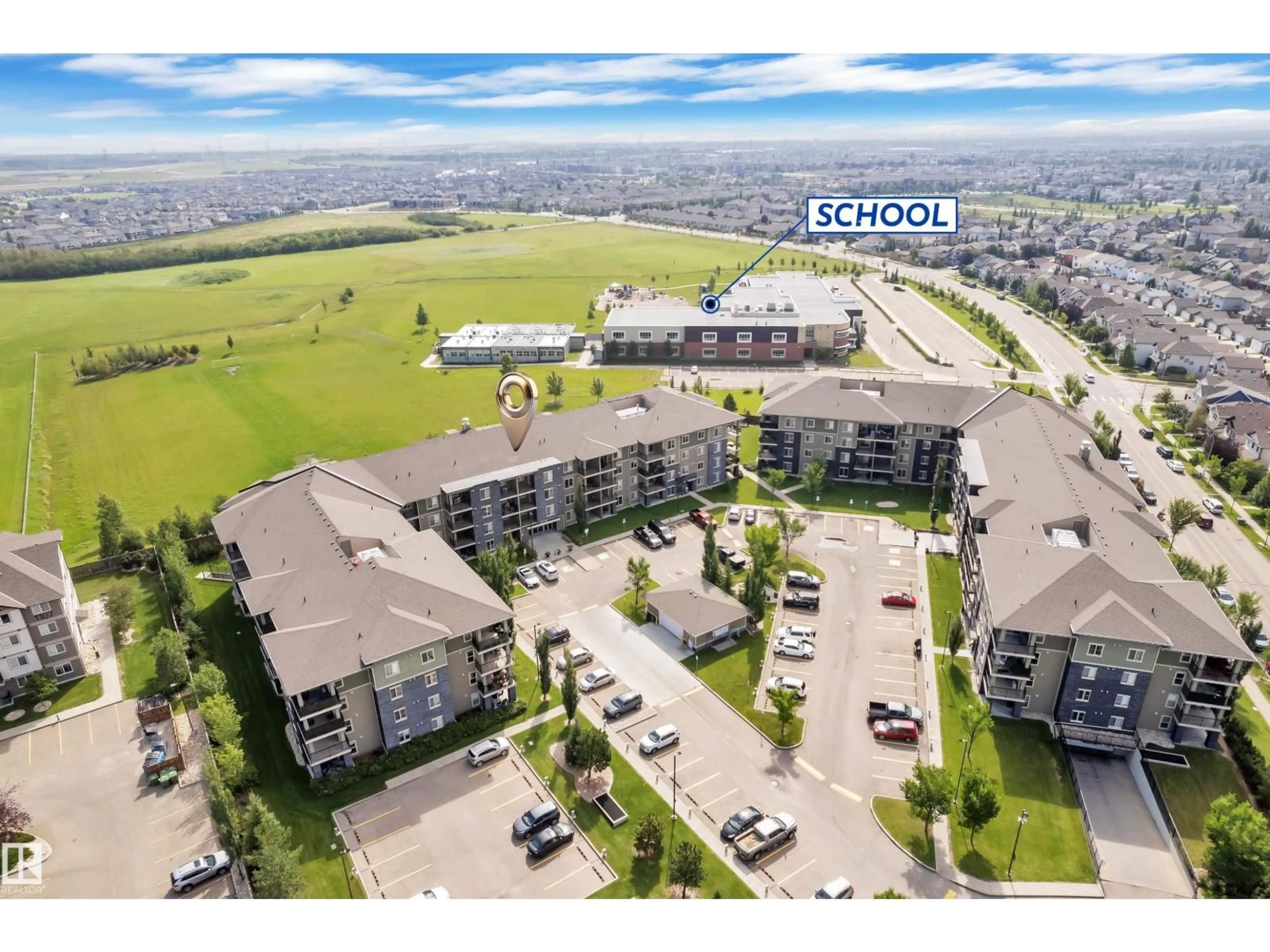 A pic from outside/outdoor area/front of a property/back of a property/a pic from drone, unknown for #323 - 274 MCCONACHIE DR, Edmonton Alberta T5Y3N4