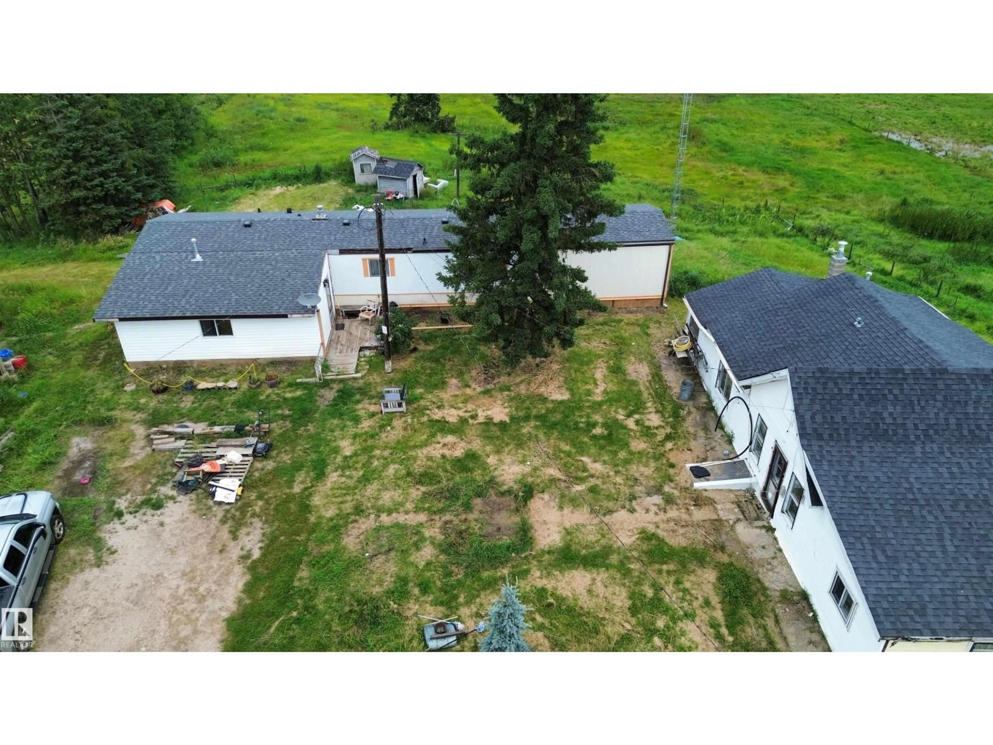 A pic from outside/outdoor area/front of a property/back of a property/a pic from drone, unknown for 59305 RANGE ROAD 131, Rural Smoky Lake County Alberta T0A3L0