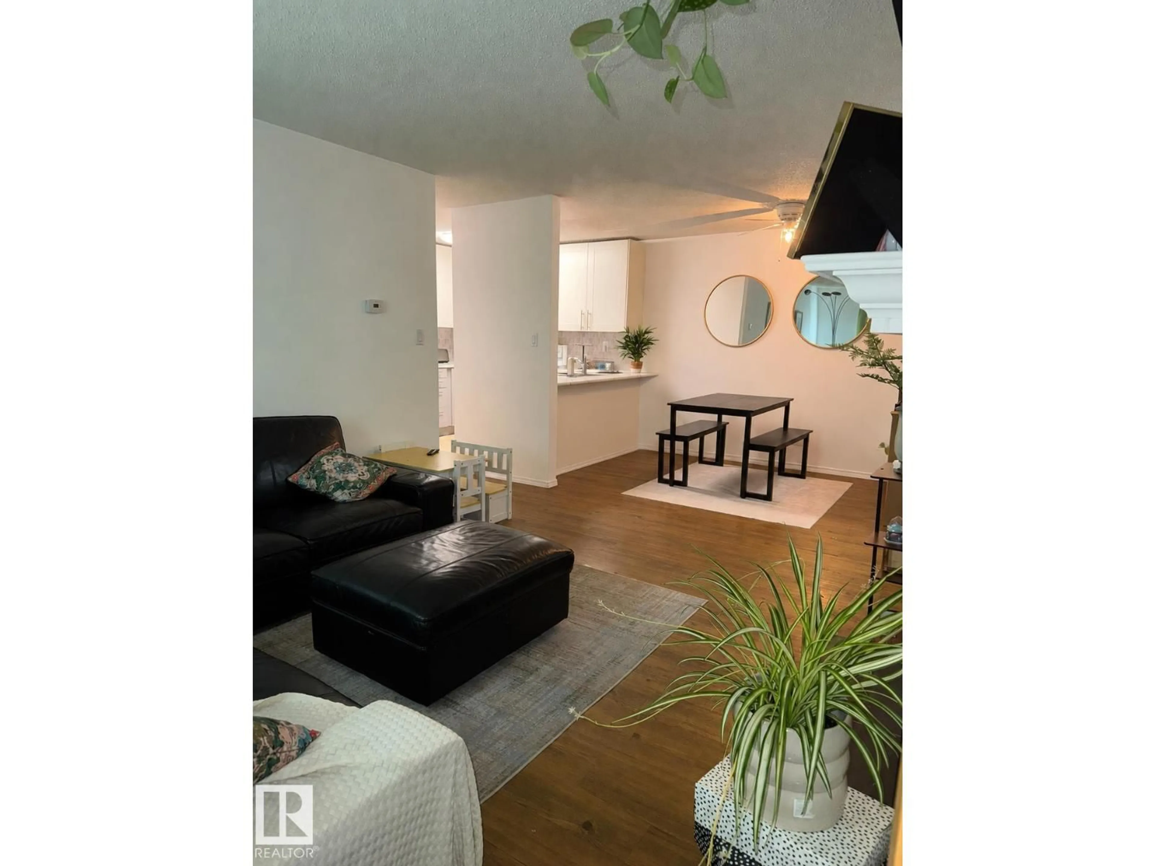 Living room with furniture, wood/laminate floor for 302 - 44 ALPINE PL, St. Albert Alberta T8N3Y2