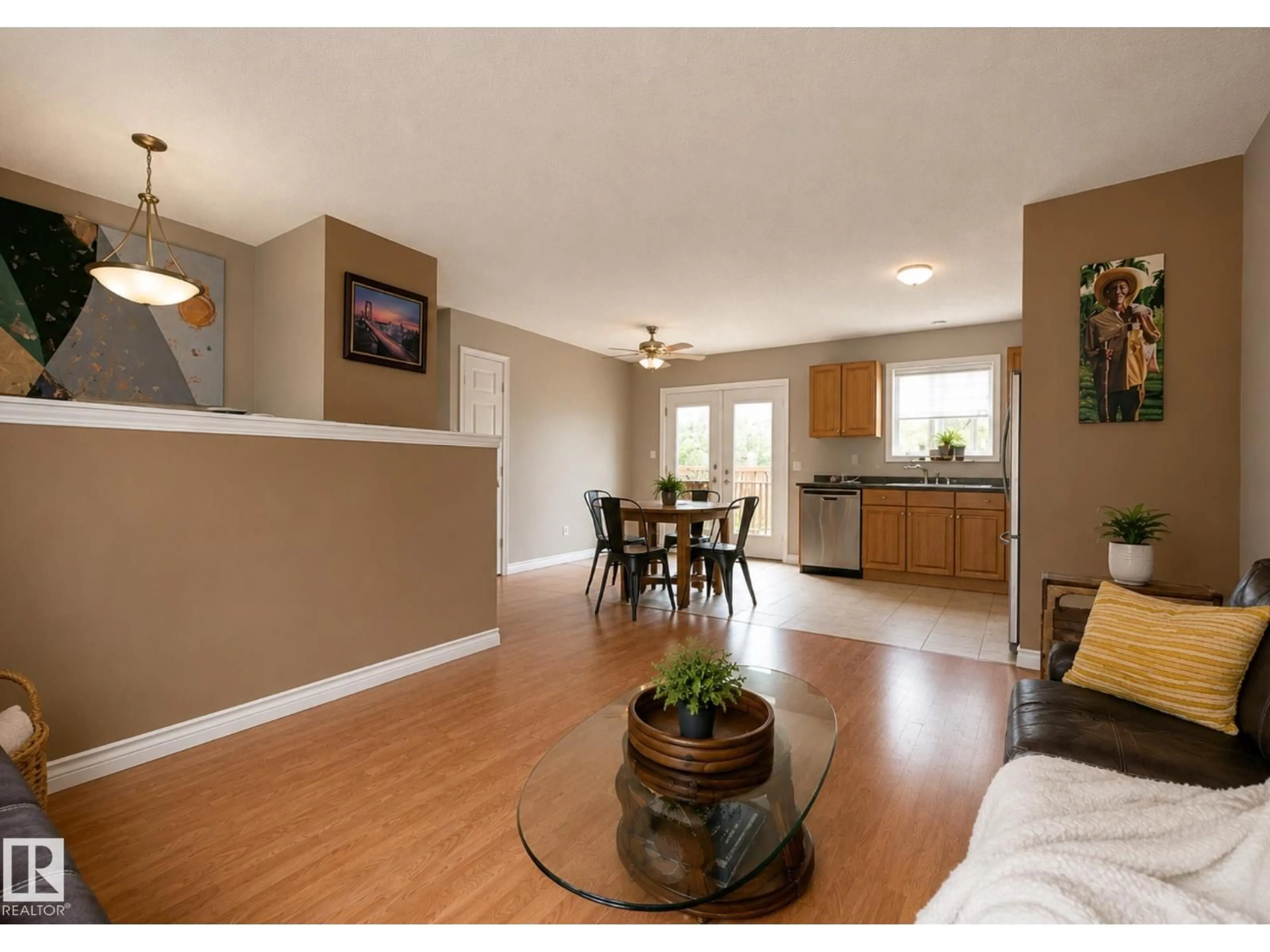 Living room with furniture, wood/laminate floor for 4 SPRUCE MEADOW LN, Bon Accord Alberta T0A0K0
