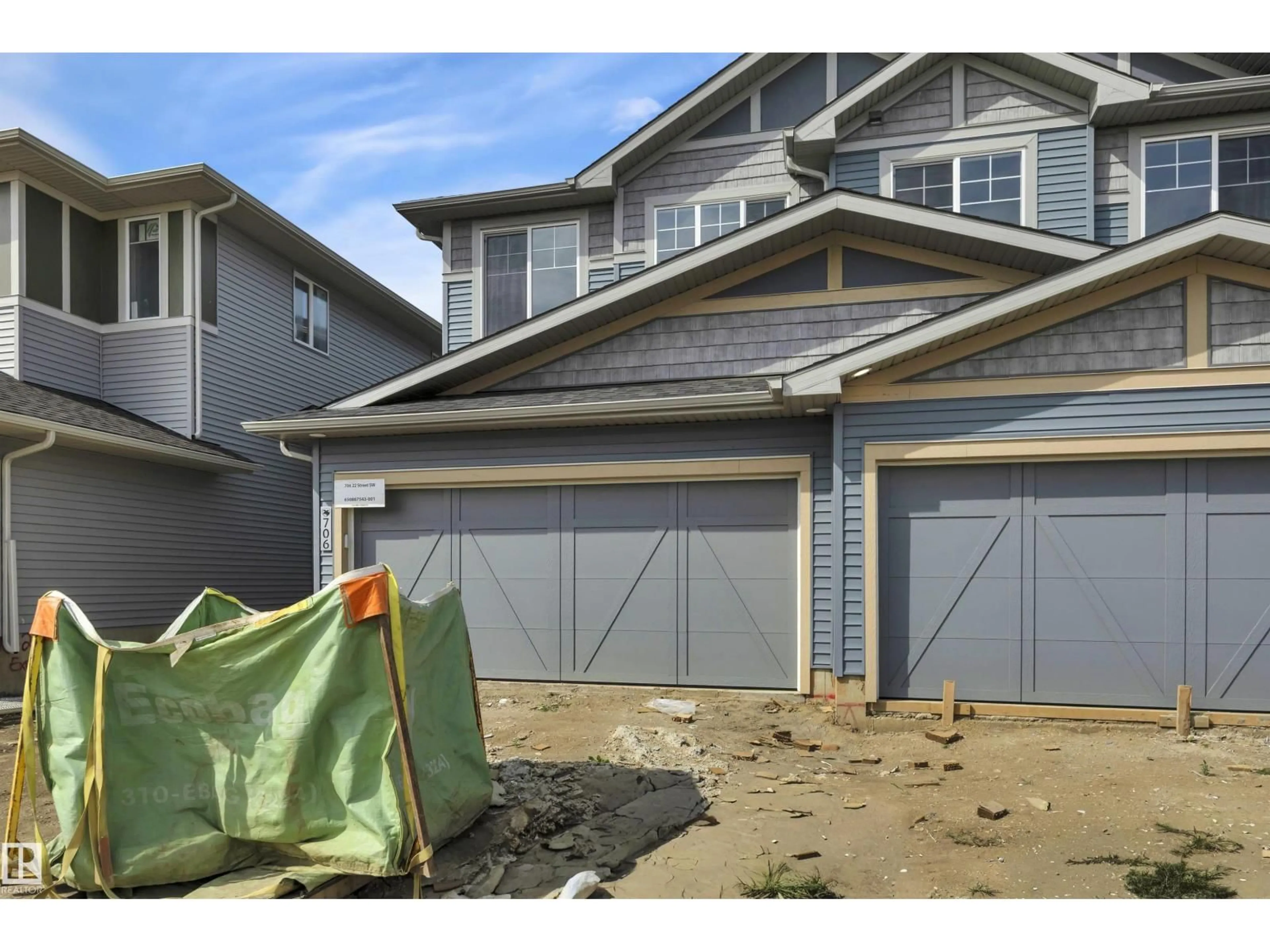 Home with vinyl exterior material, street for 706 22 ST, Edmonton Alberta T6X3L4