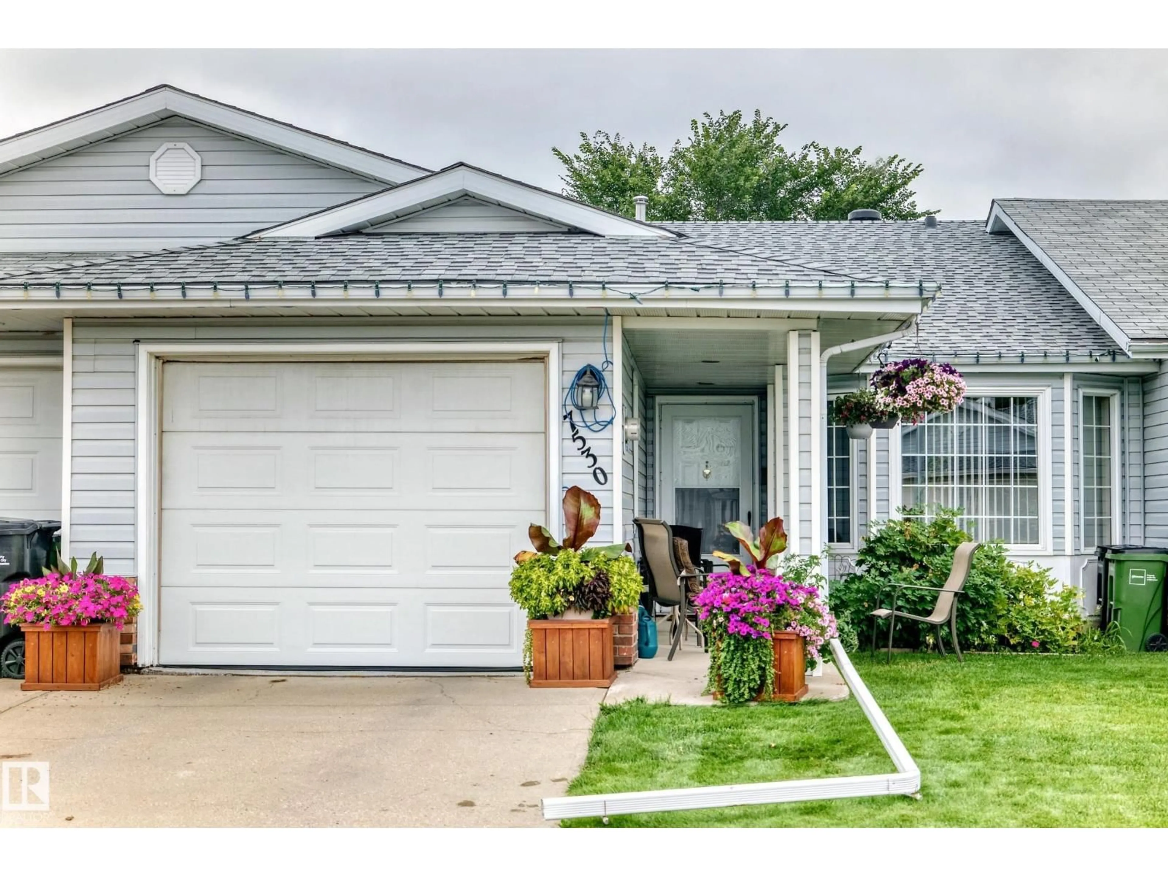 Home with vinyl exterior material, street for 7530 137A AV, Edmonton Alberta T5C3R4