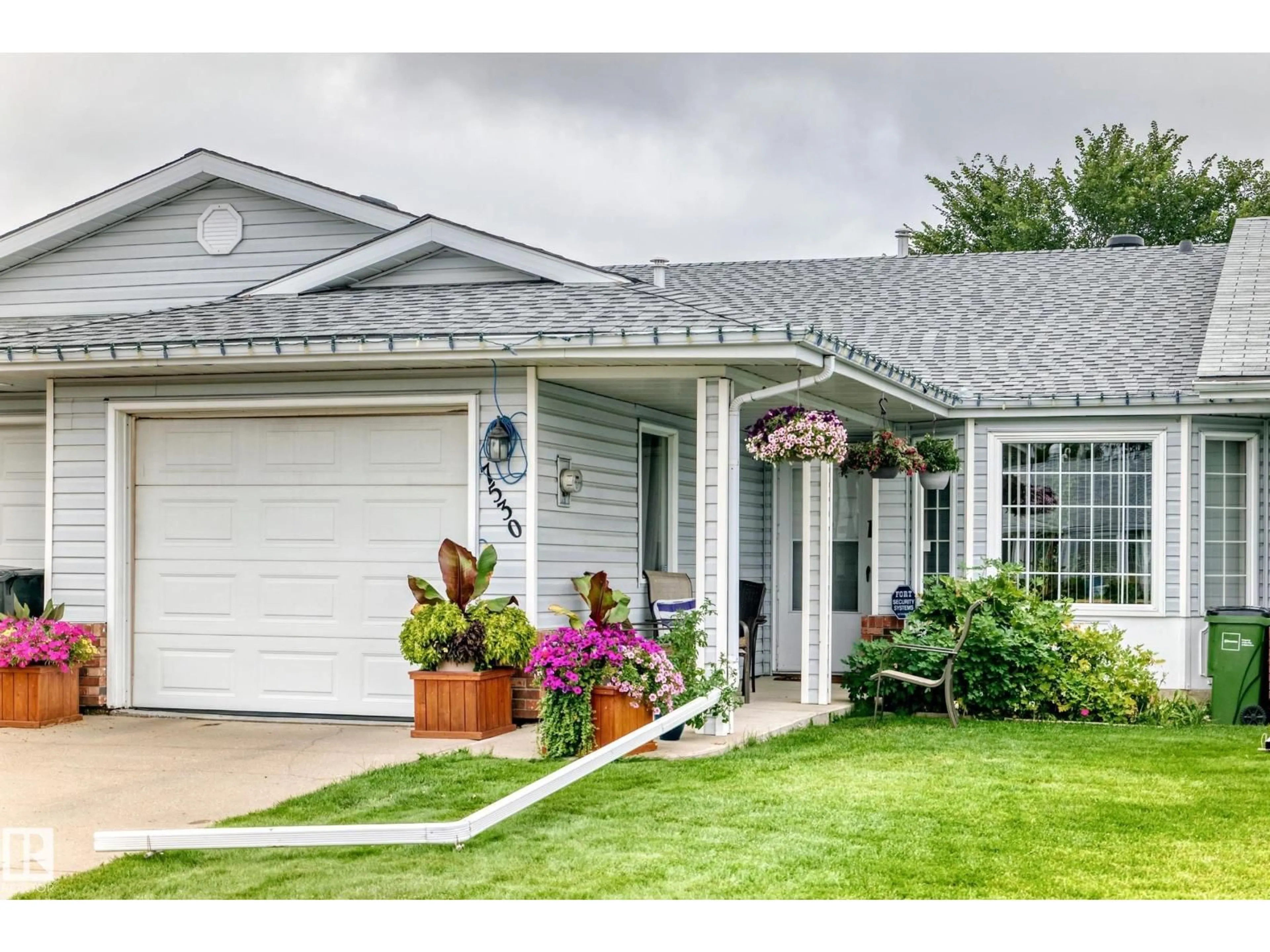 Home with vinyl exterior material, street for 7530 137A AV, Edmonton Alberta T5C3R4