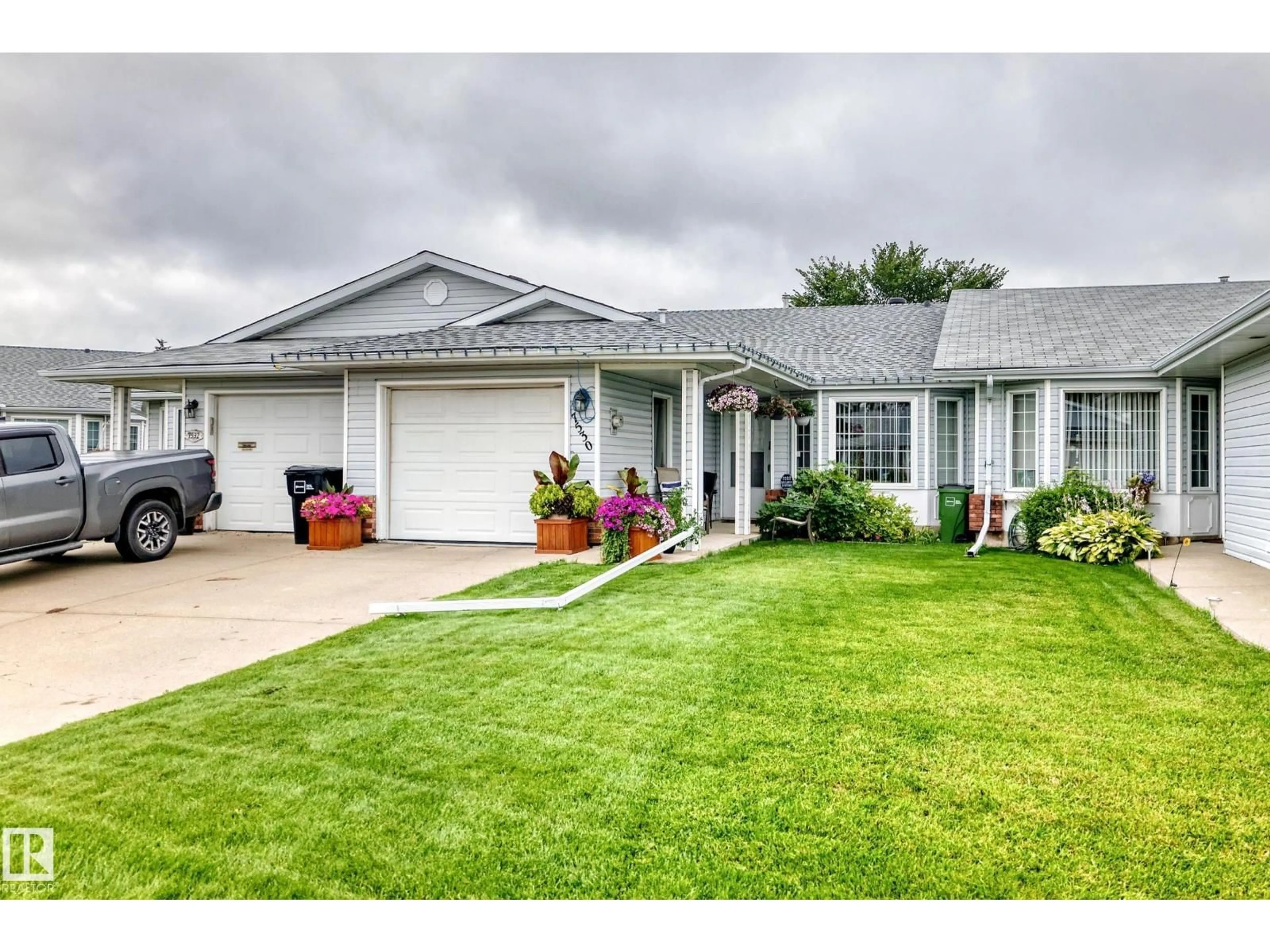 Home with vinyl exterior material, street for 7530 137A AV, Edmonton Alberta T5C3R4