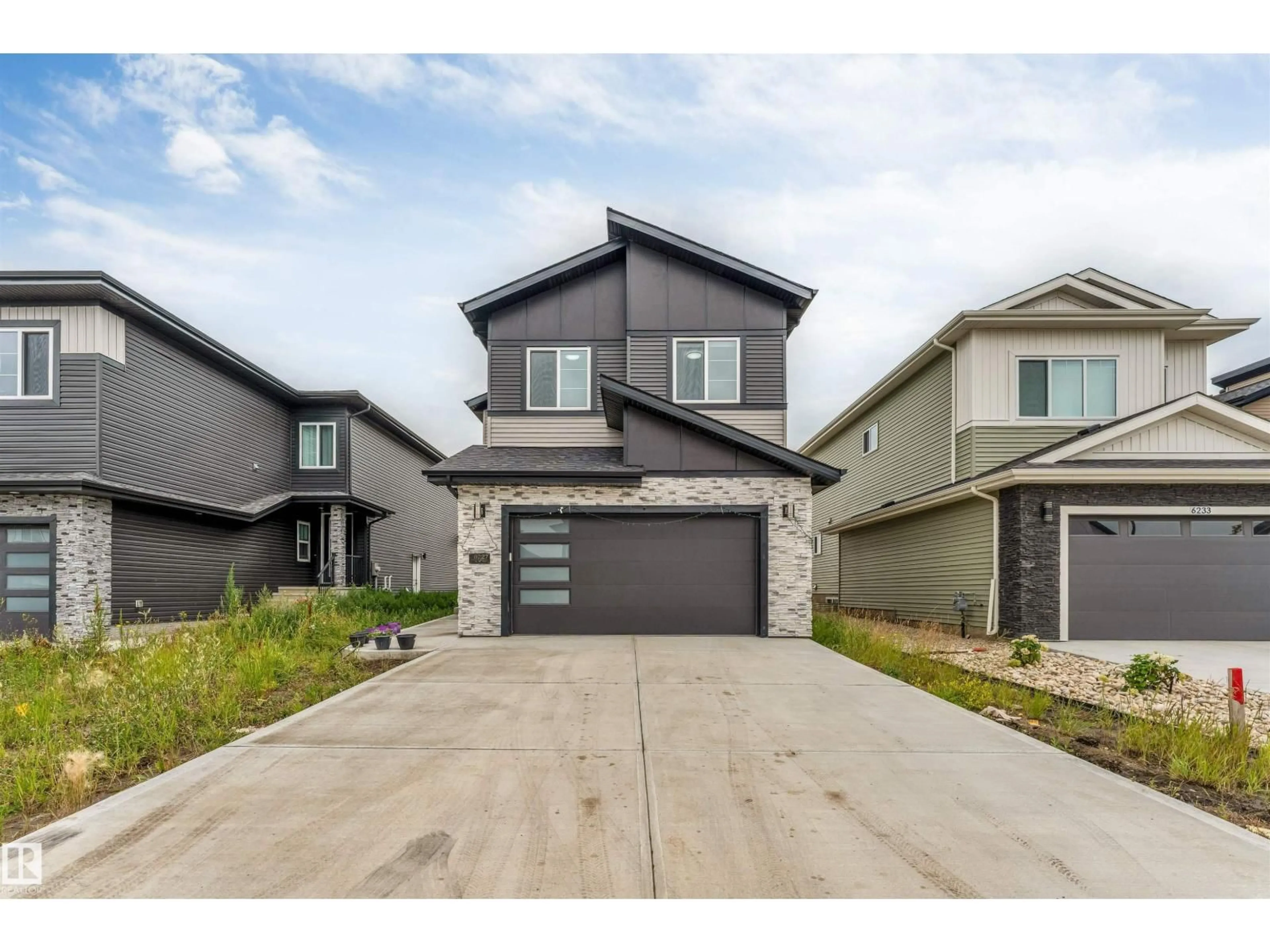 Home with brick exterior material, street for NE - 6227 19 ST, Rural Leduc County Alberta T4X3C8