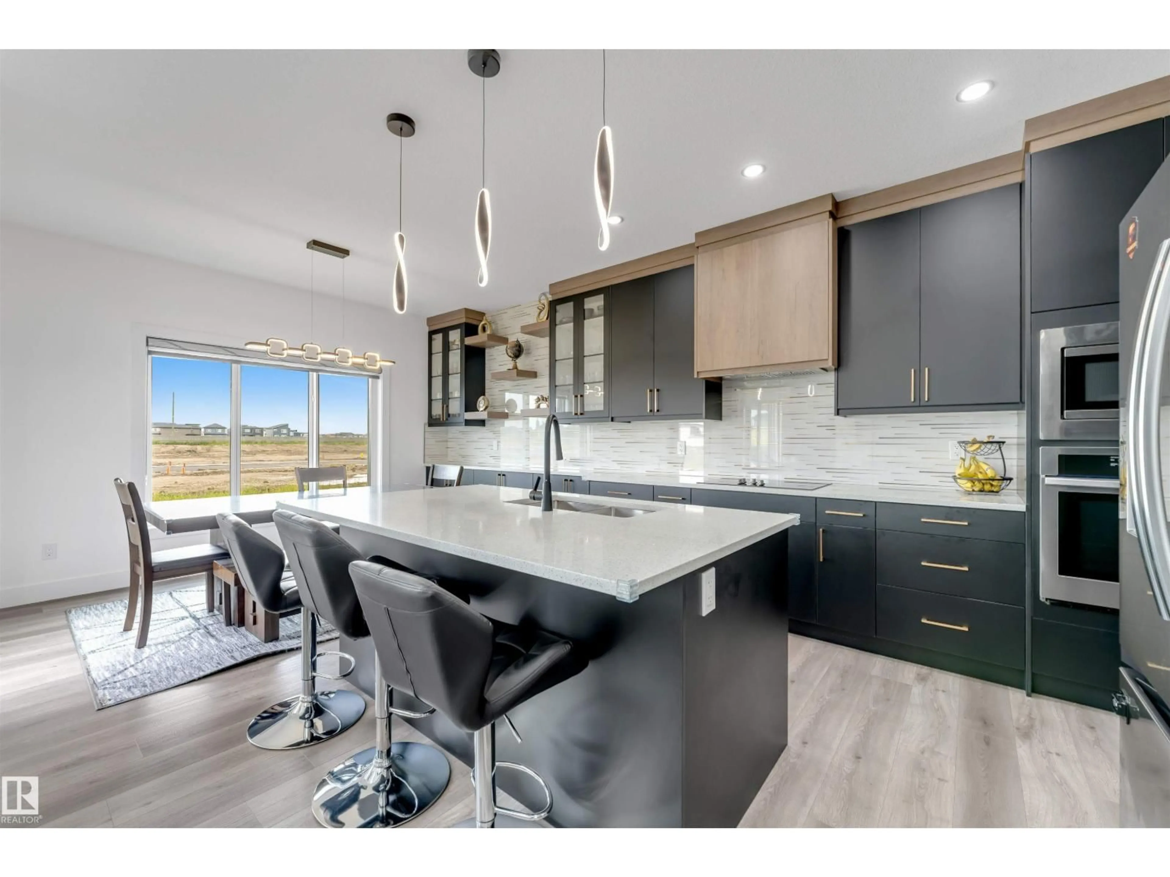 Open concept kitchen, ceramic/tile floor for NE - 6227 19 ST, Rural Leduc County Alberta T4X3C8
