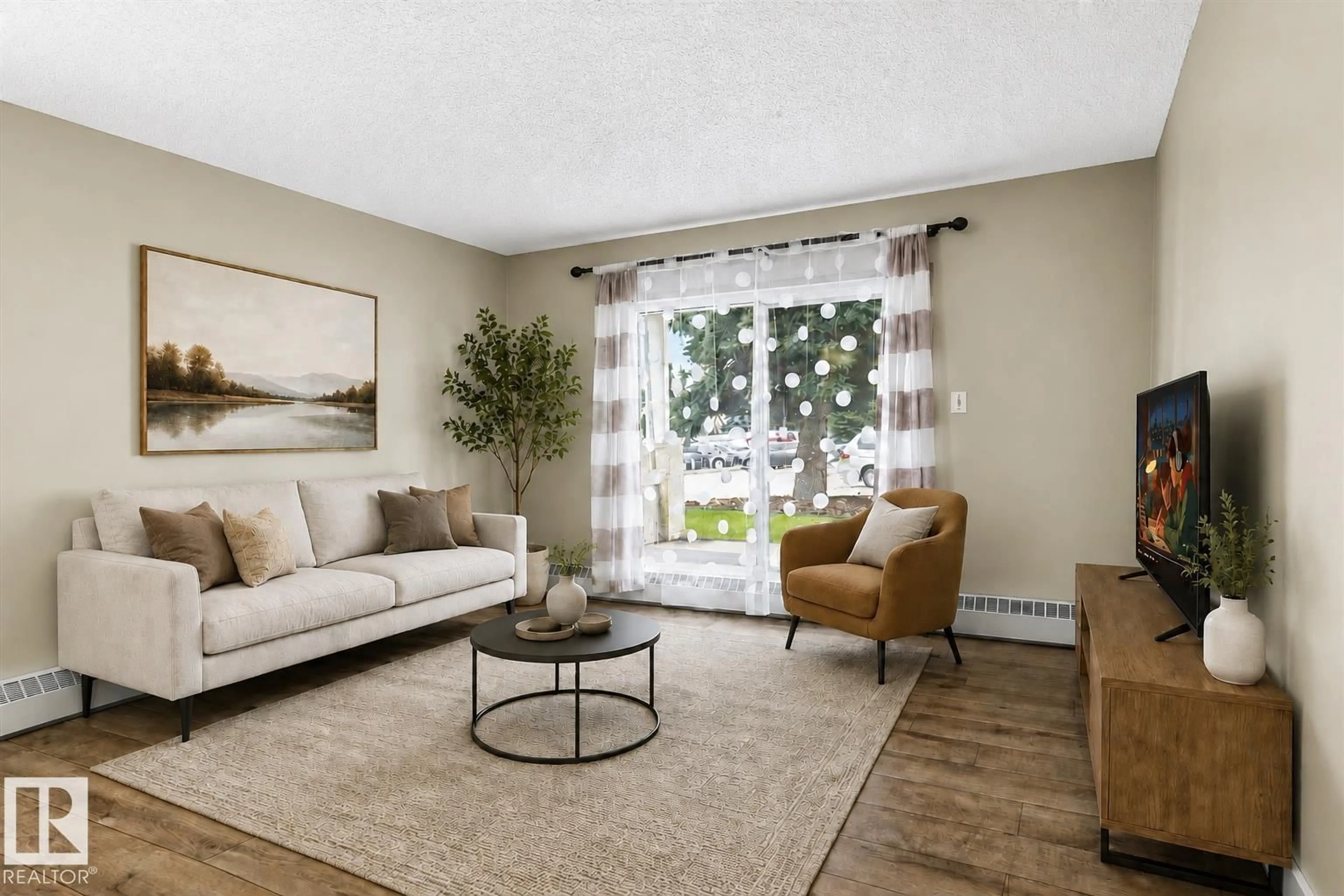 Living room with furniture, carpet floor for #102 - 6710 158 AV, Edmonton Alberta T5Z3A7