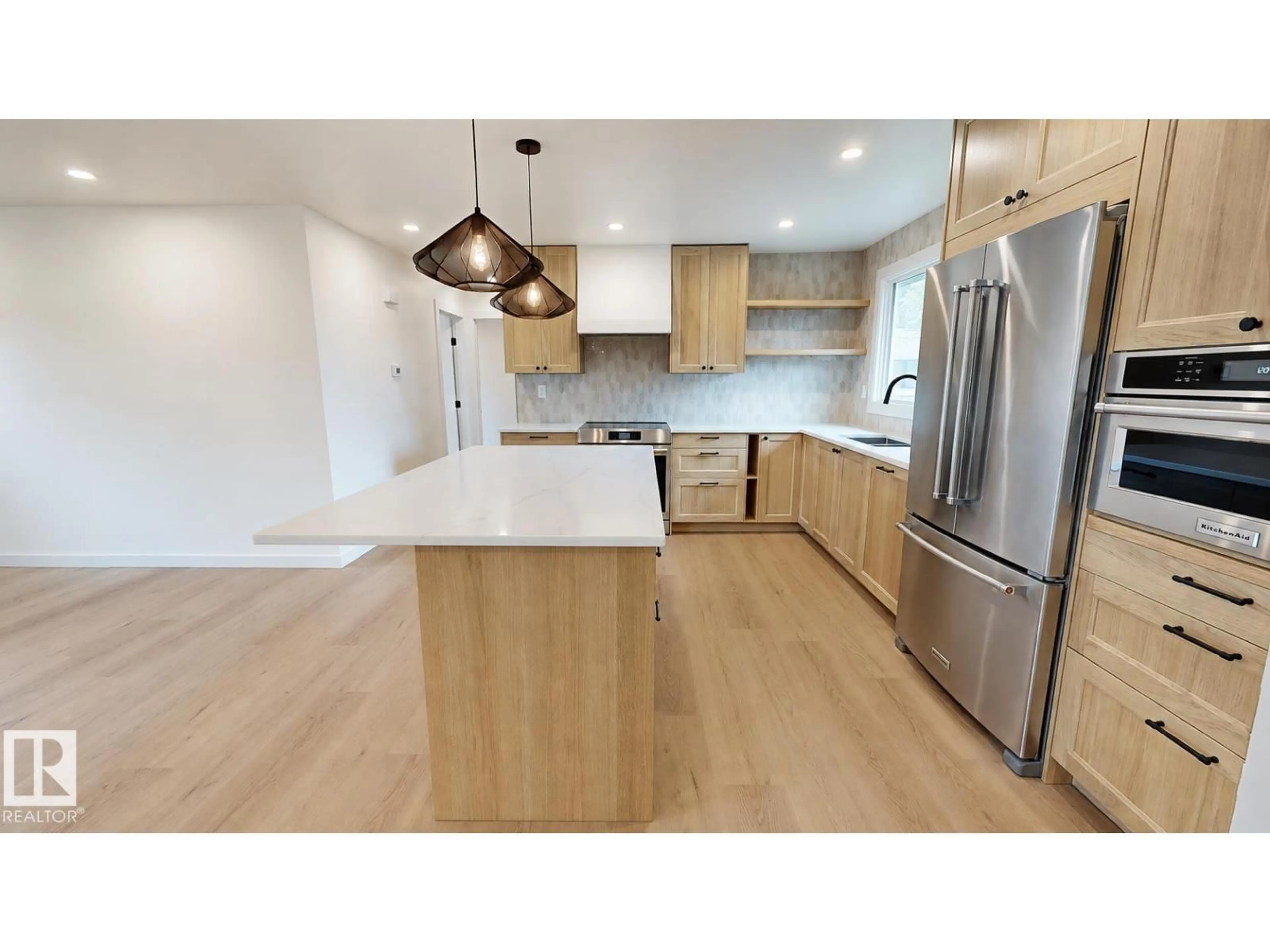 Open concept kitchen, wood/laminate floor for 67 MENLO CR, Sherwood Park Alberta T8A0R9