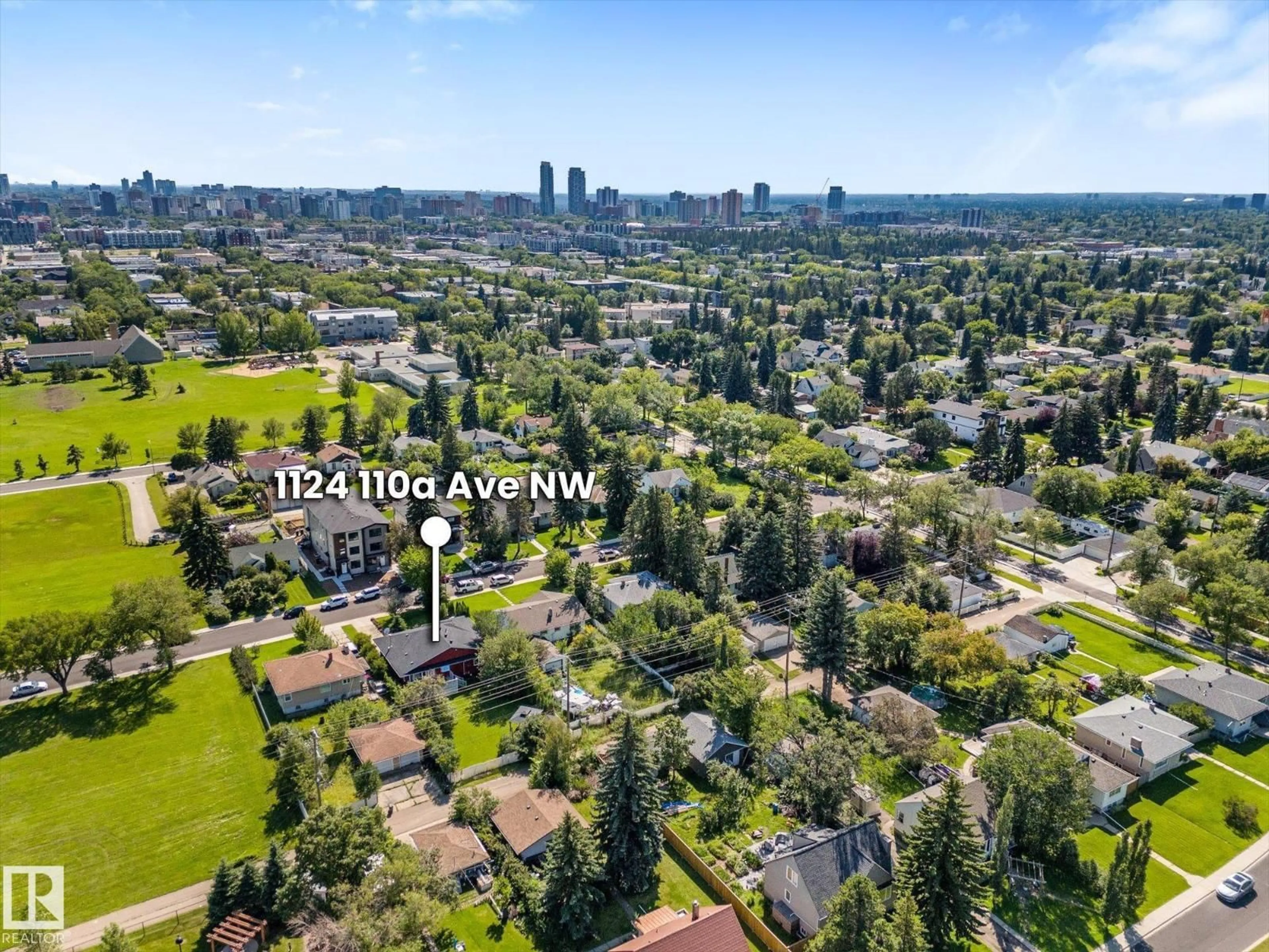 A pic from outside/outdoor area/front of a property/back of a property/a pic from drone, unknown for 11124 110A AV, Edmonton Alberta T5H1K1