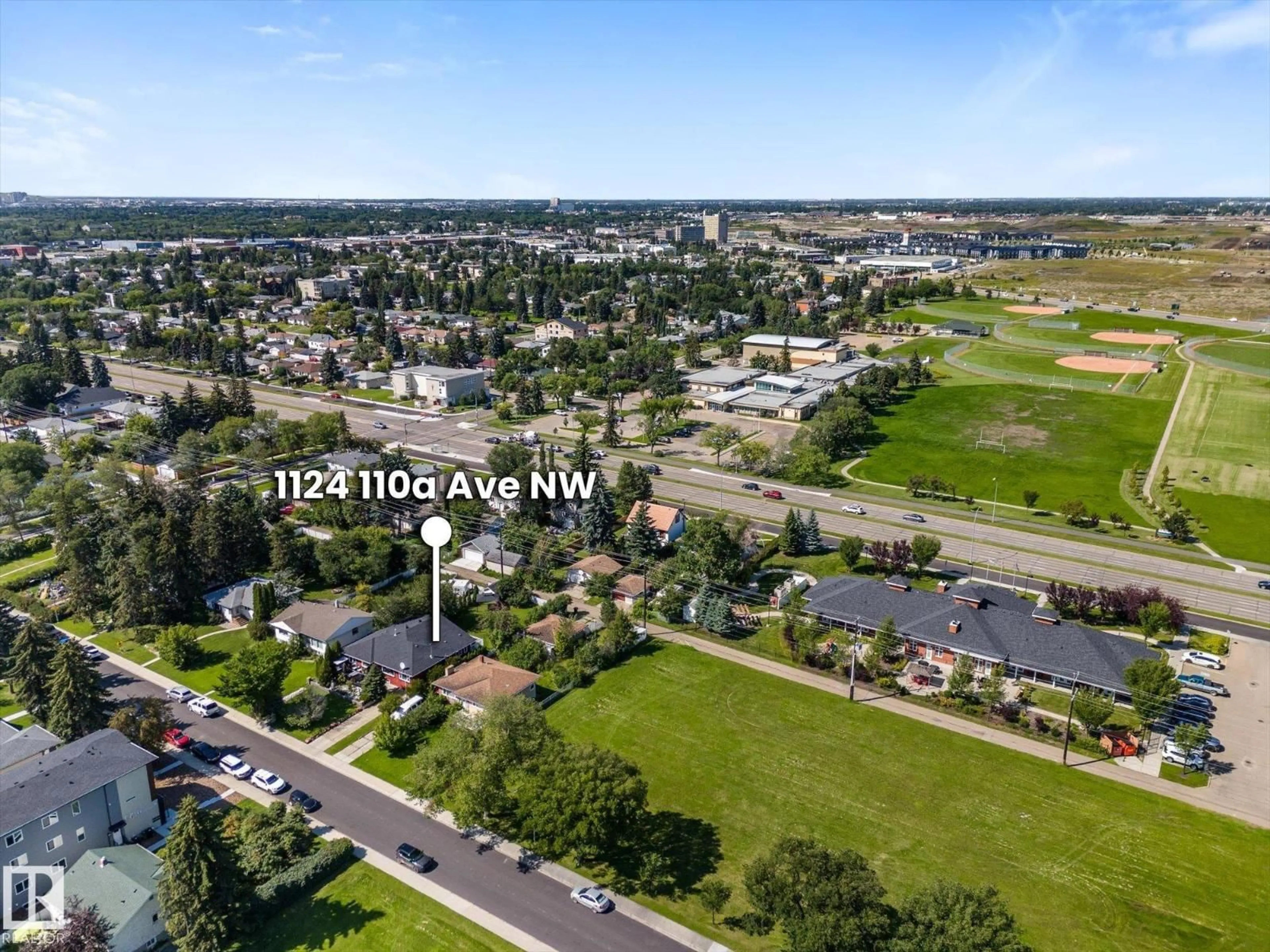 A pic from outside/outdoor area/front of a property/back of a property/a pic from drone, water/lake/river/ocean view for 11124 110A AV, Edmonton Alberta T5H1K1