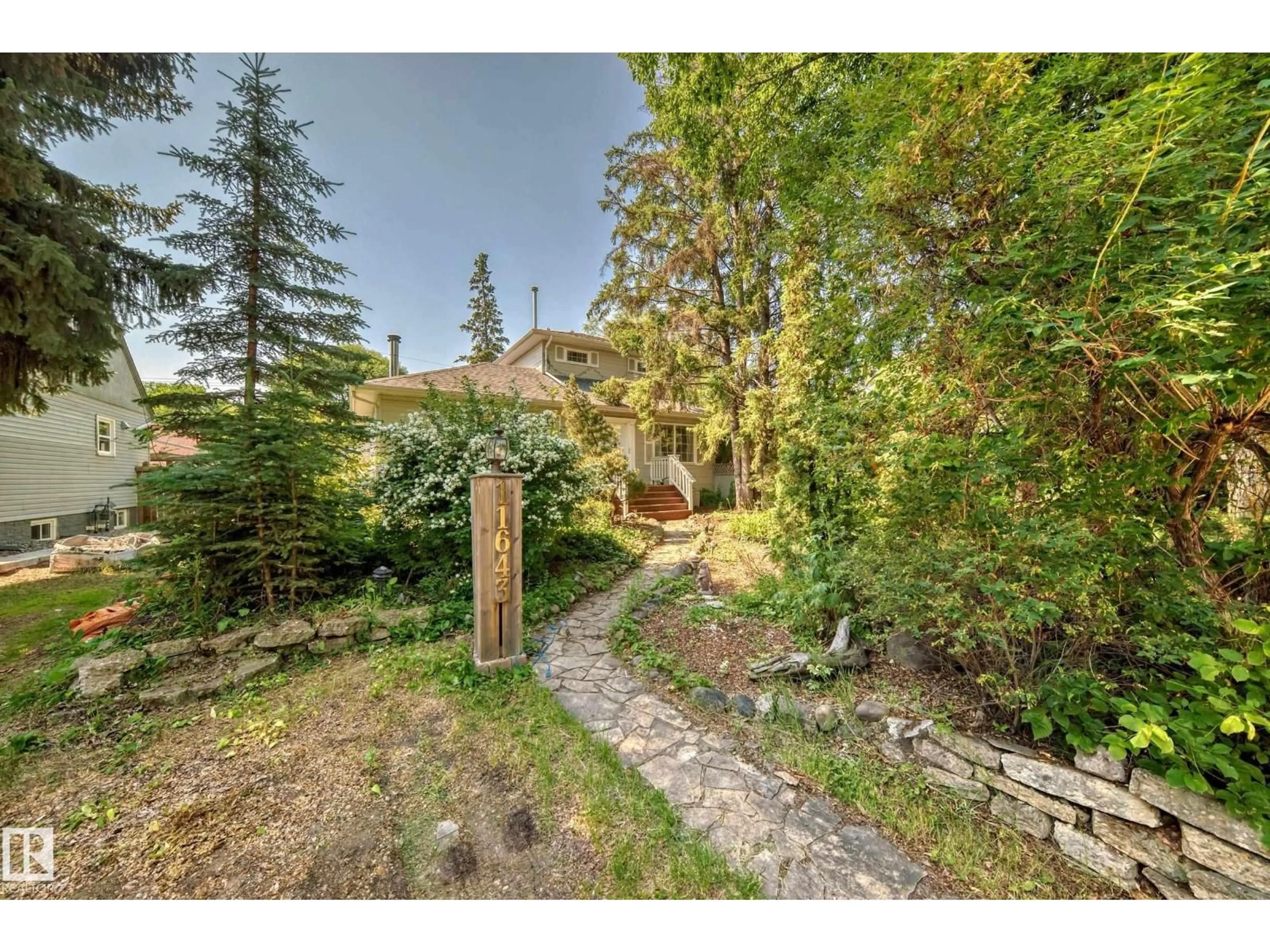 A pic from outside/outdoor area/front of a property/back of a property/a pic from drone, forest/trees view for 11643 76 AV, Edmonton Alberta T6G0K9