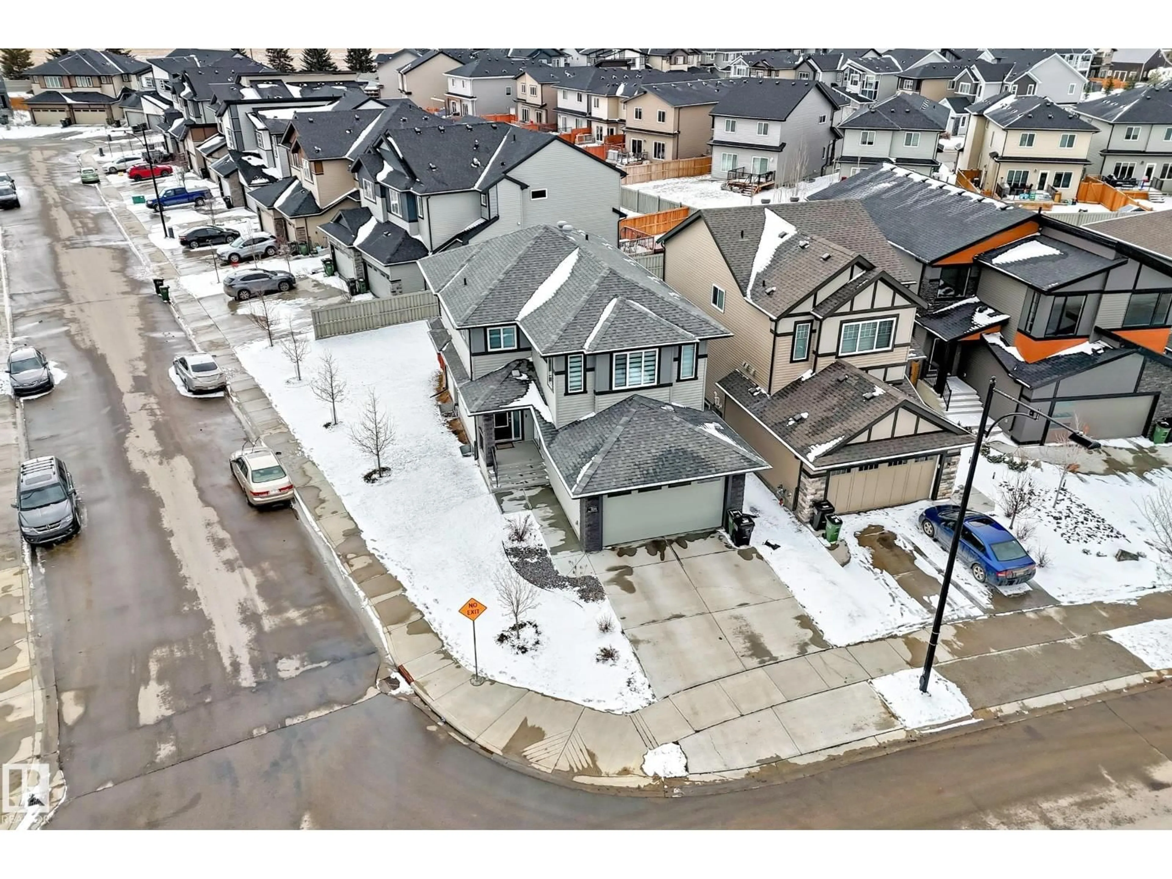 A pic from outside/outdoor area/front of a property/back of a property/a pic from drone, street for SW - 7035 CHIVERS LO, Edmonton Alberta T6W3Y7