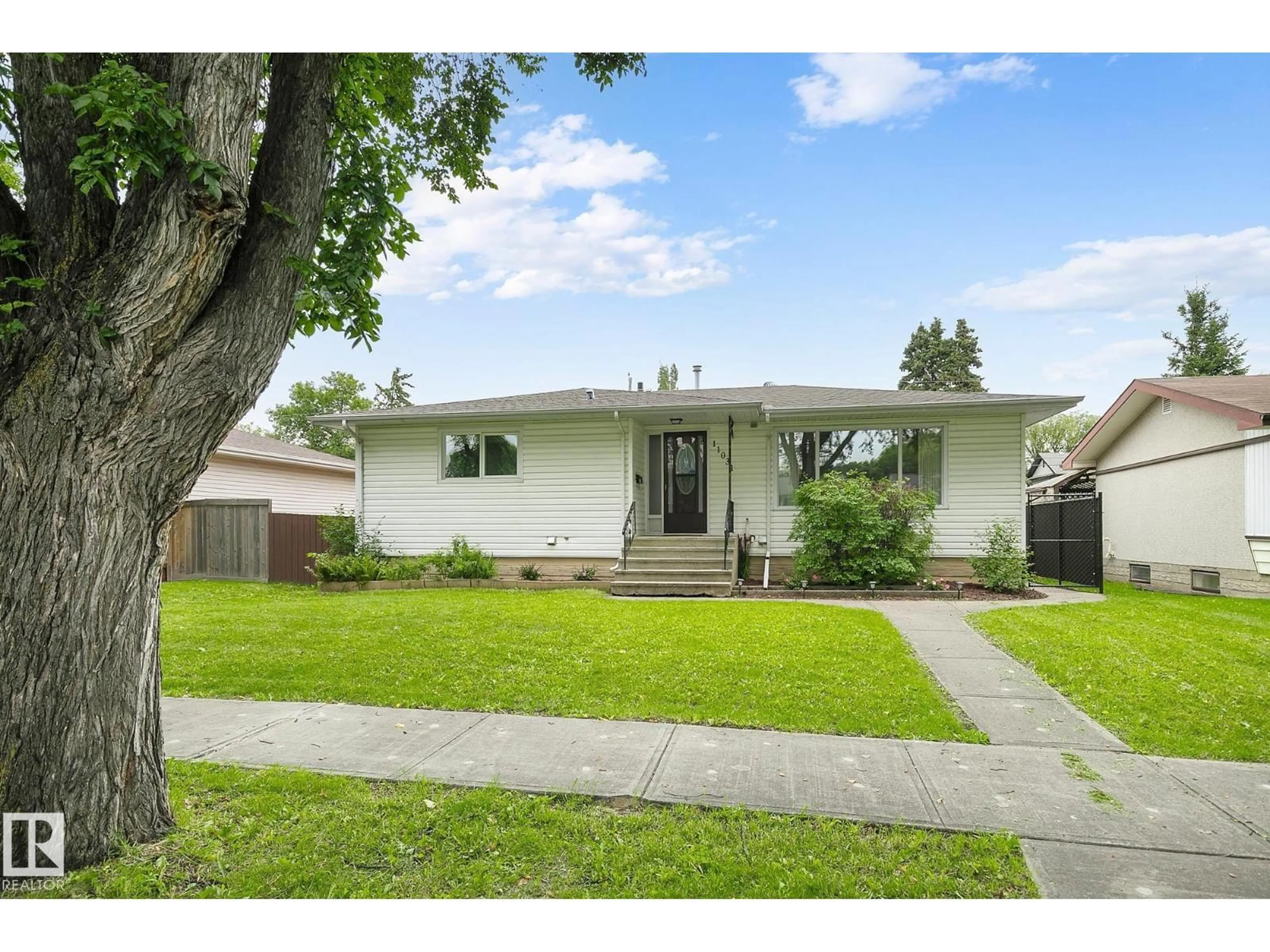 Home with vinyl exterior material, street for NW - 11031 152 ST, Edmonton Alberta T5P1Z9