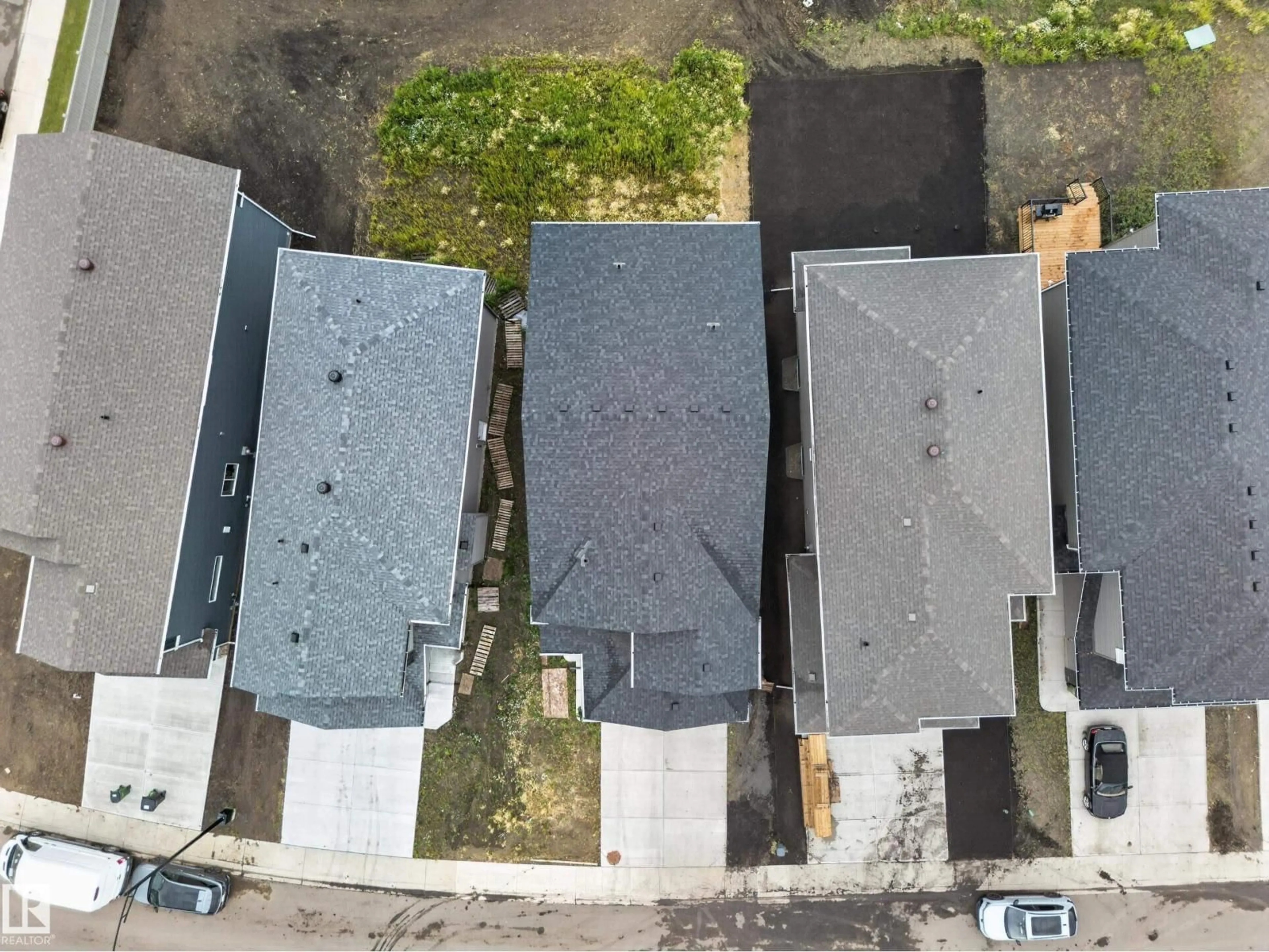 A pic from outside/outdoor area/front of a property/back of a property/a pic from drone, street for 7011 177 AV, Edmonton Alberta T5Z0W8