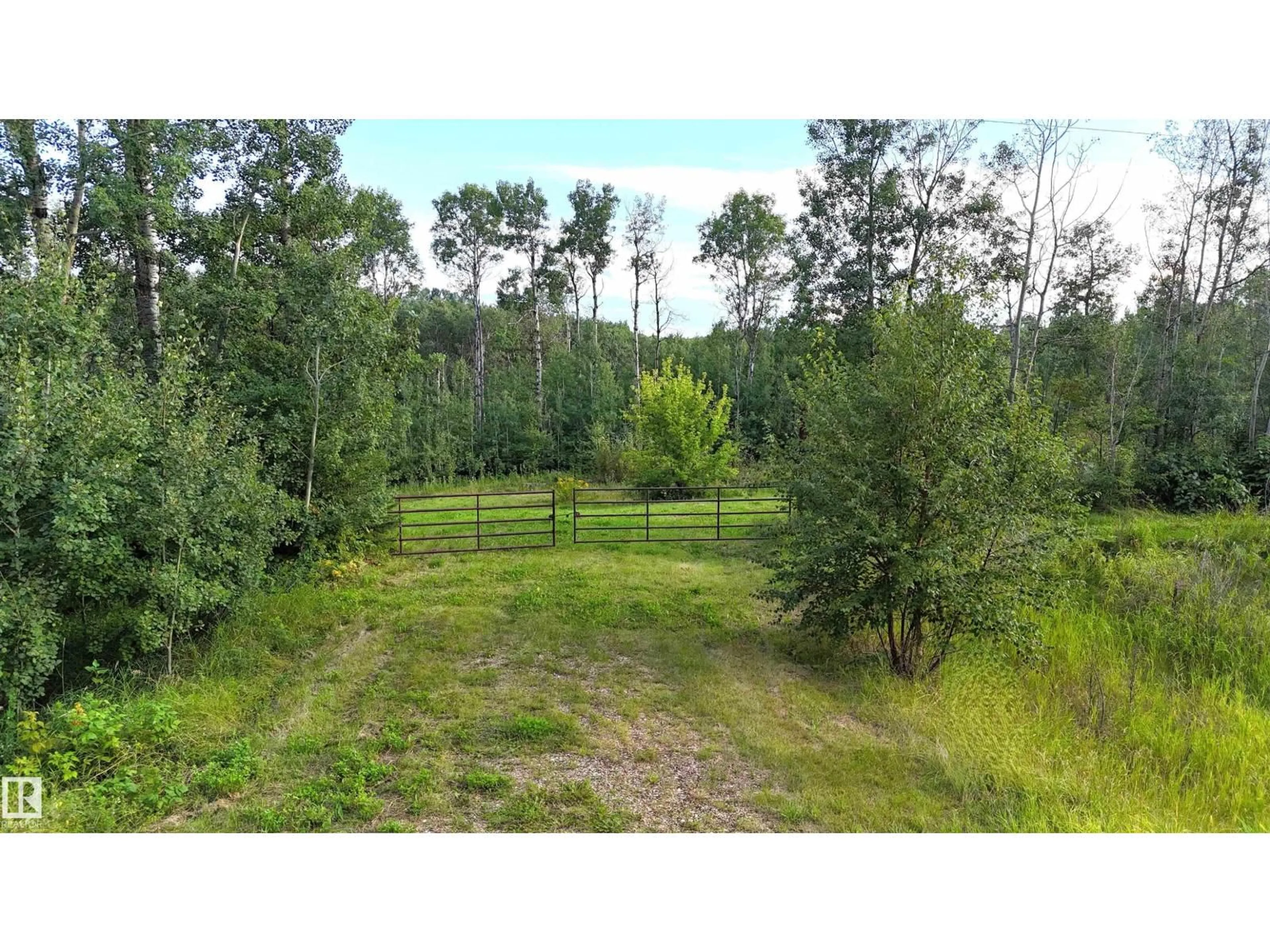 A pic from outside/outdoor area/front of a property/back of a property/a pic from drone, forest/trees view for 60 52228 RGE ROAD 30, Rural Parkland County Alberta T7Y2M5
