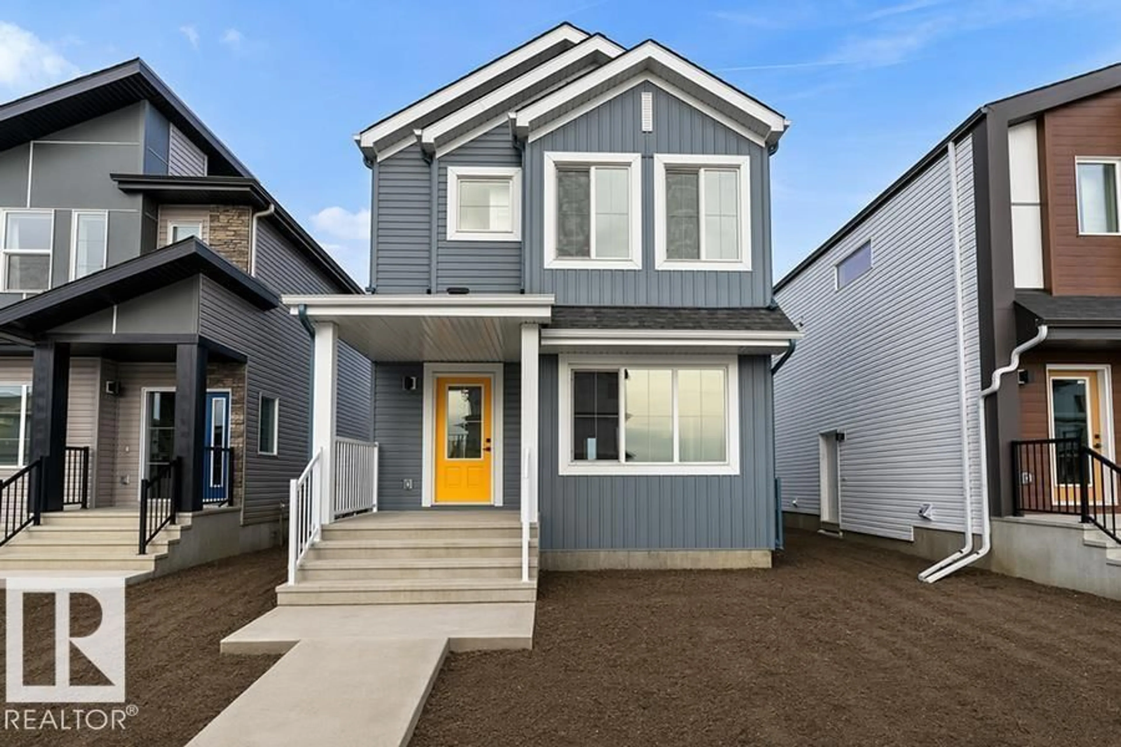 Home with vinyl exterior material, street for 1216 MCLEOD AV, Spruce Grove Alberta T7X4B7