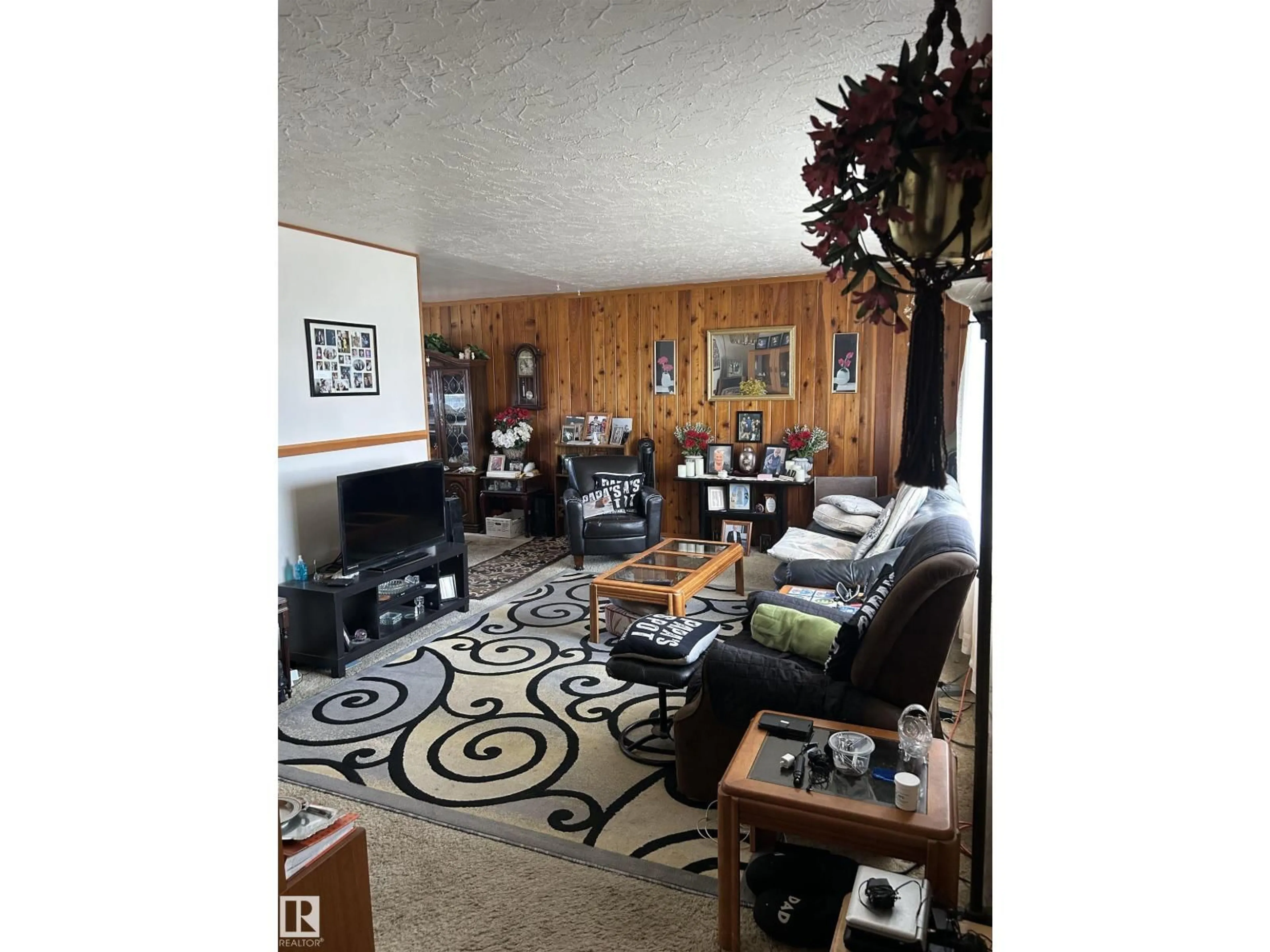 Living room with furniture, wood/laminate floor for NW - 9612 75A ST, Edmonton Alberta T6C2J3