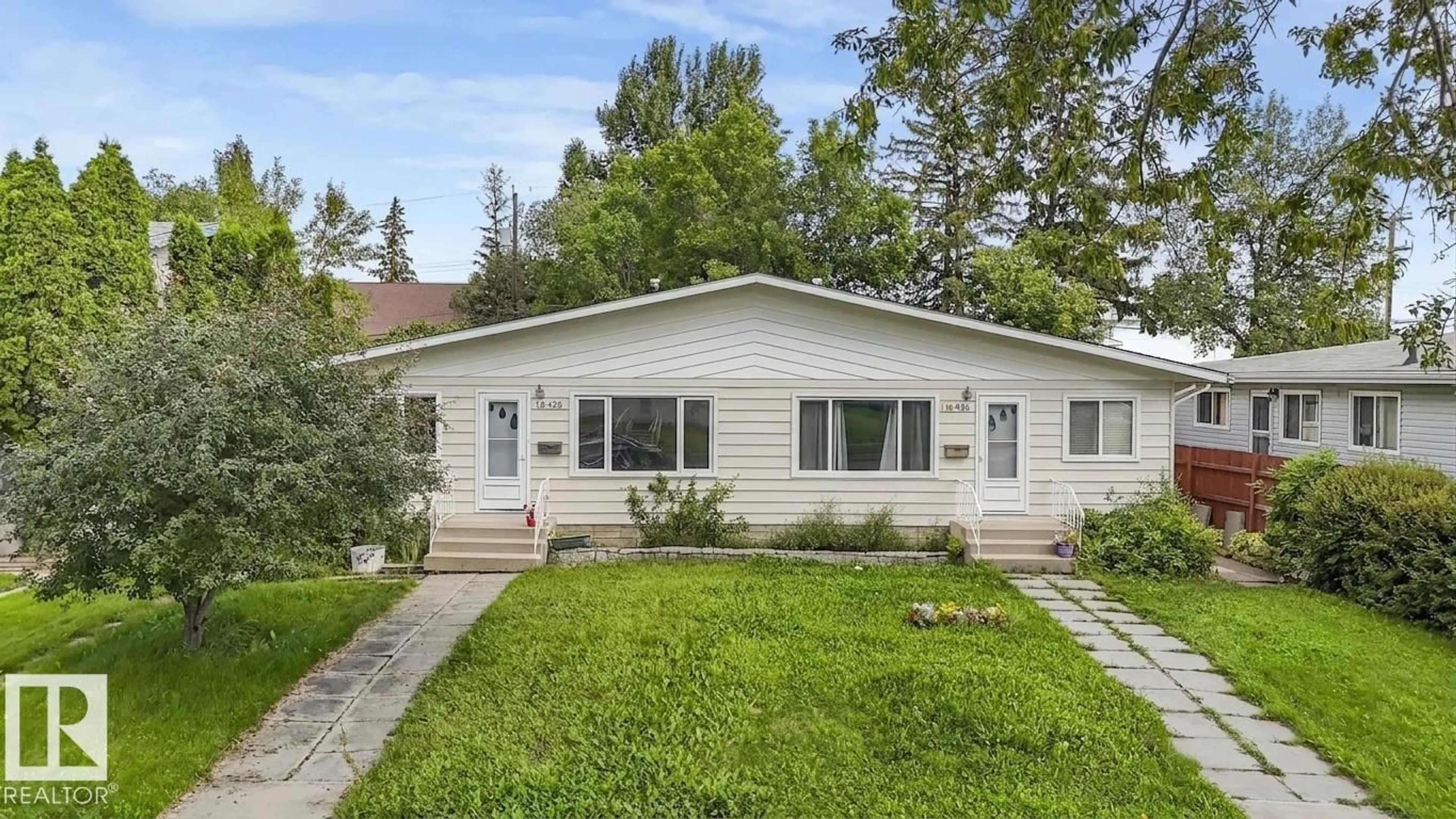 Home with vinyl exterior material, street for NW - 16428 88 AV, Edmonton Alberta T5R4M7