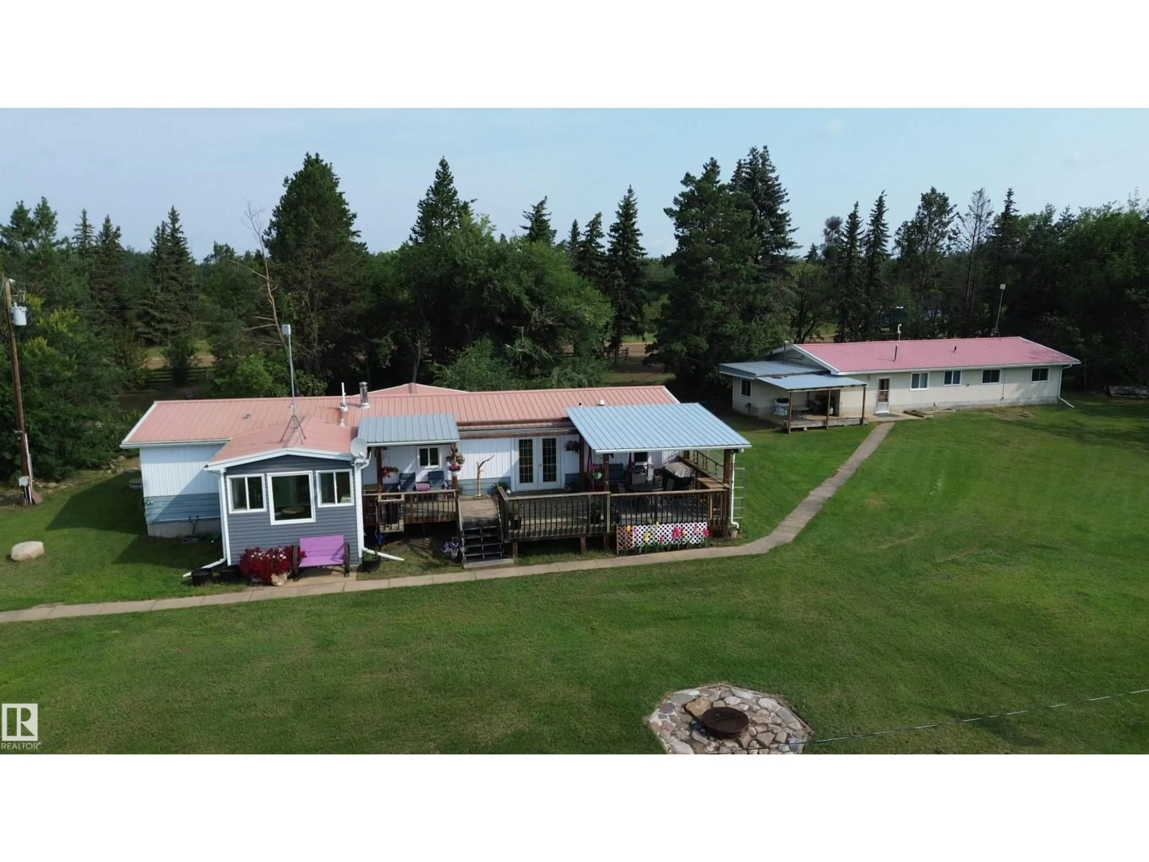 A pic from outside/outdoor area/front of a property/back of a property/a pic from drone, mountain view for 22529 TWP RD 590, Rural Thorhild County Alberta T0A3J0