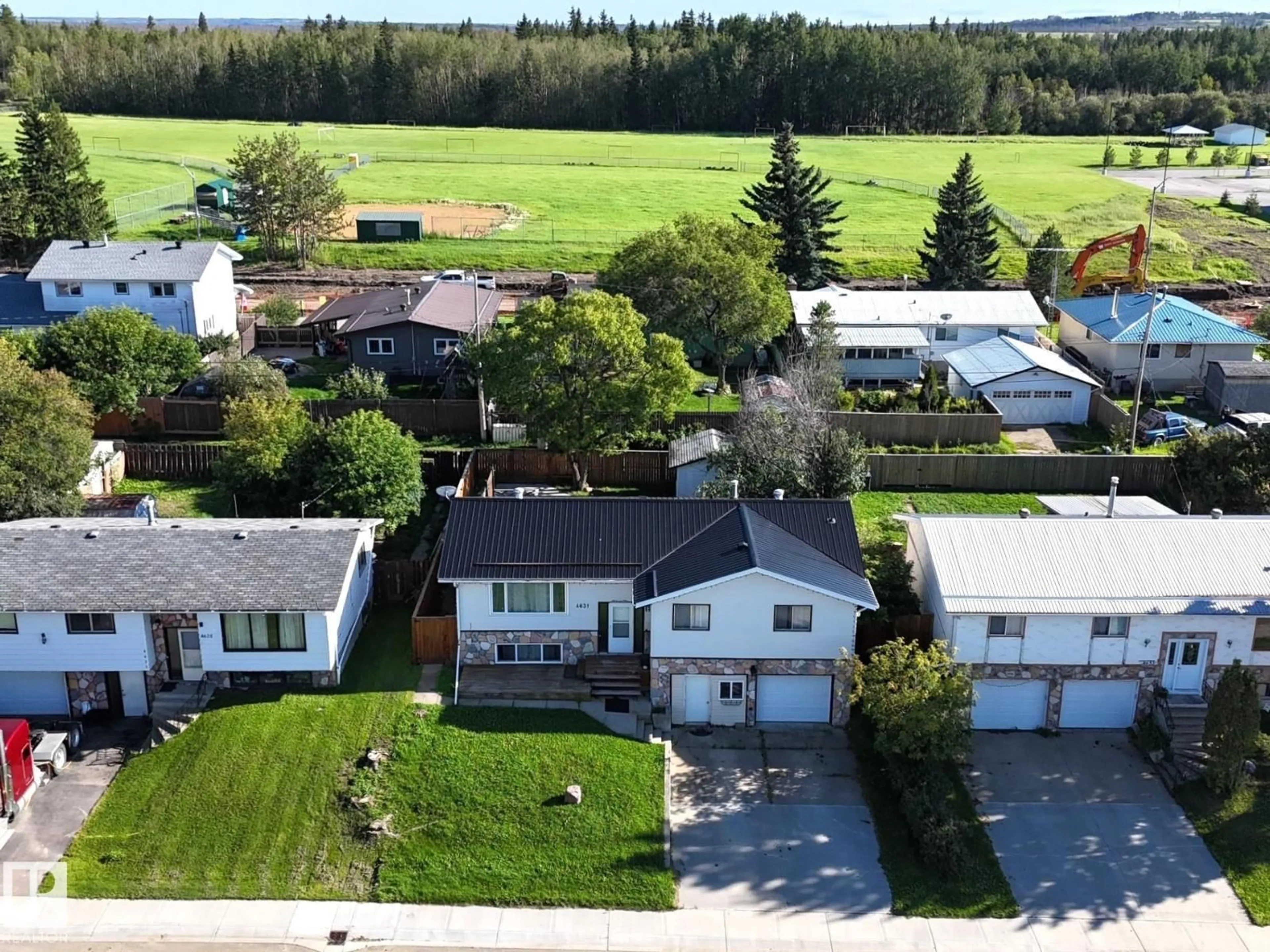 A pic from outside/outdoor area/front of a property/back of a property/a pic from drone, street for 4631 47 AV, Evansburg Alberta T0E0T0