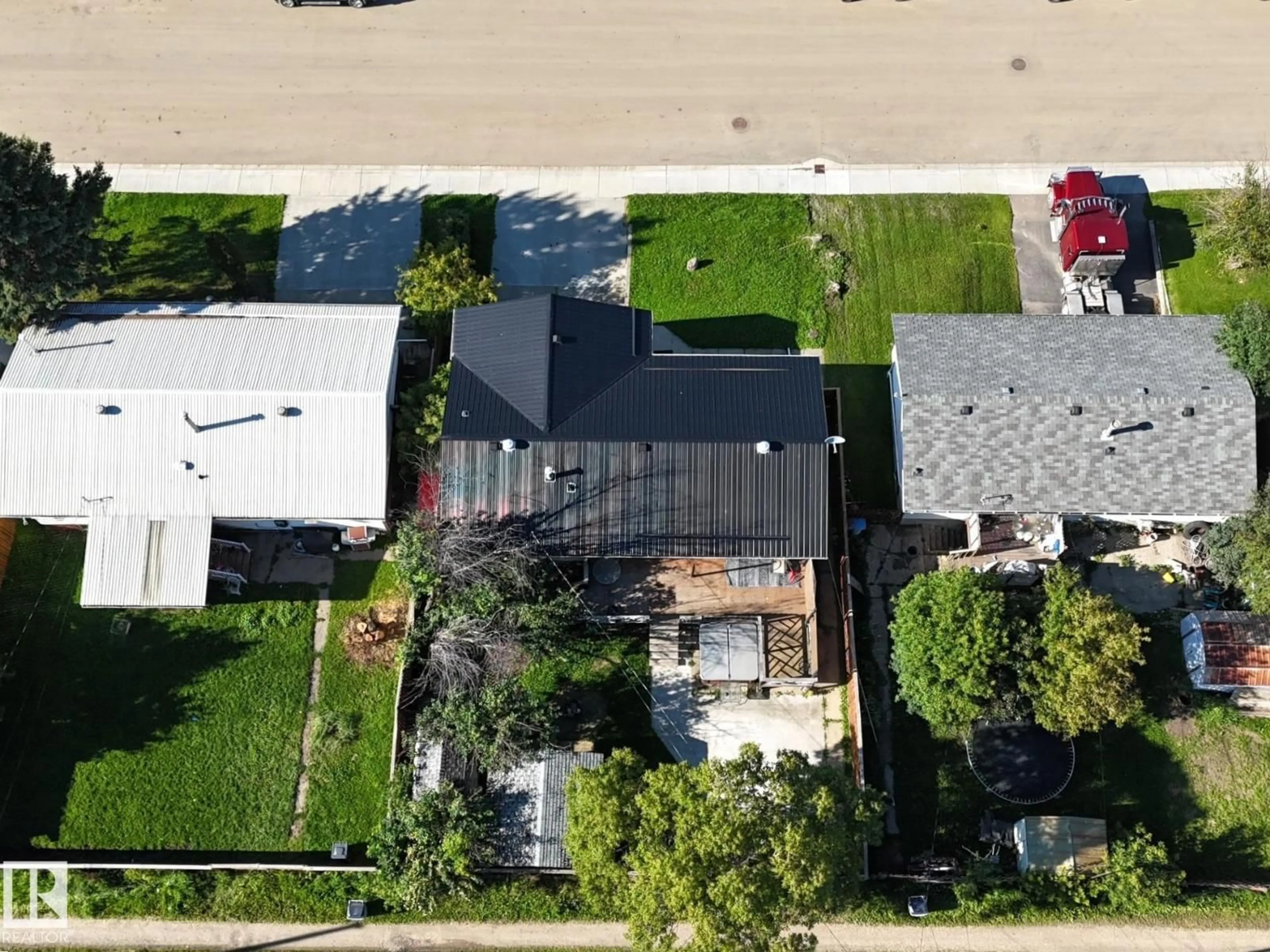 A pic from outside/outdoor area/front of a property/back of a property/a pic from drone, street for 4631 47 AV, Evansburg Alberta T0E0T0