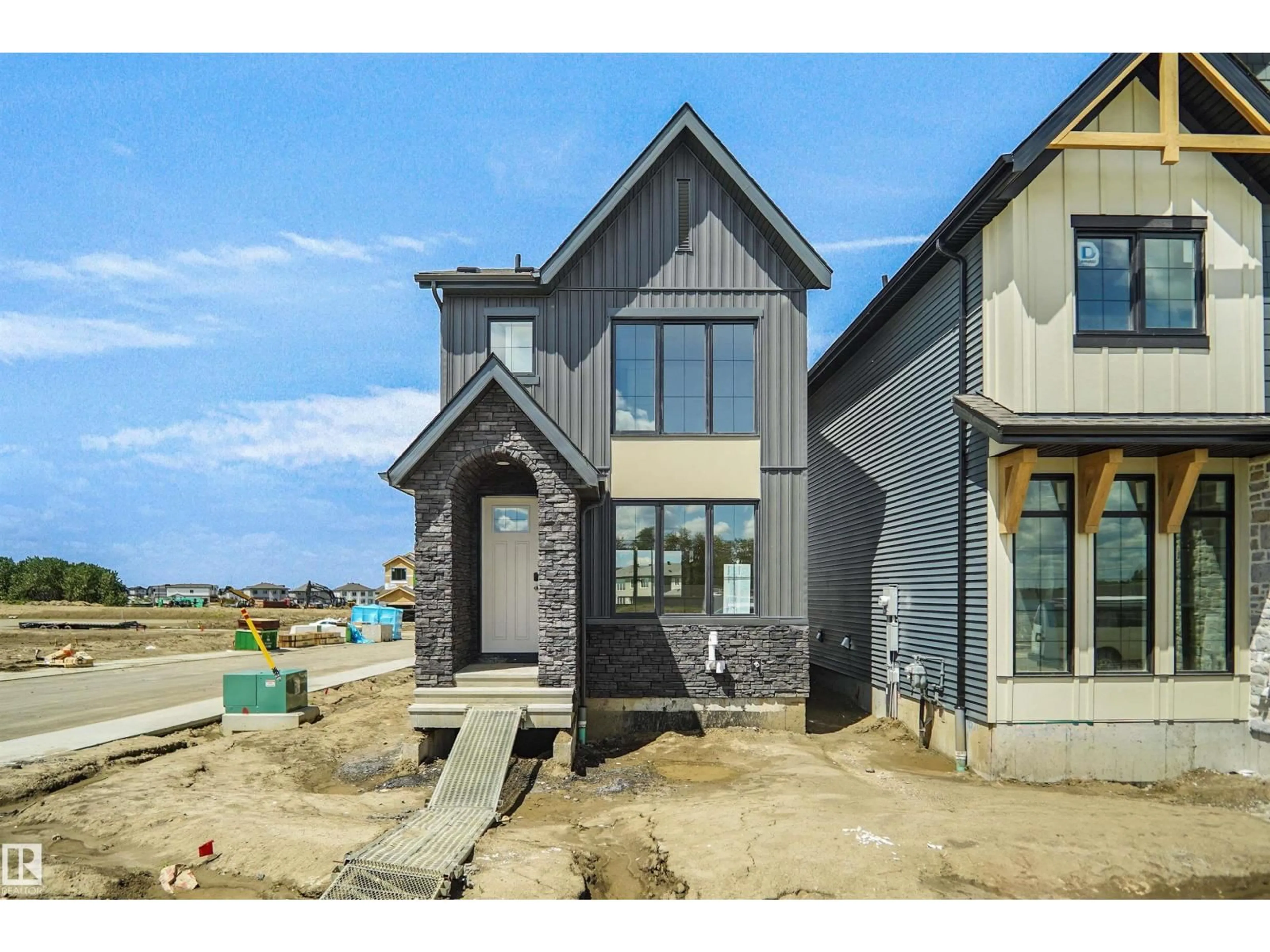 Home with brick exterior material, street for 98 JUNIPER WD, Fort Saskatchewan Alberta T8L3S4