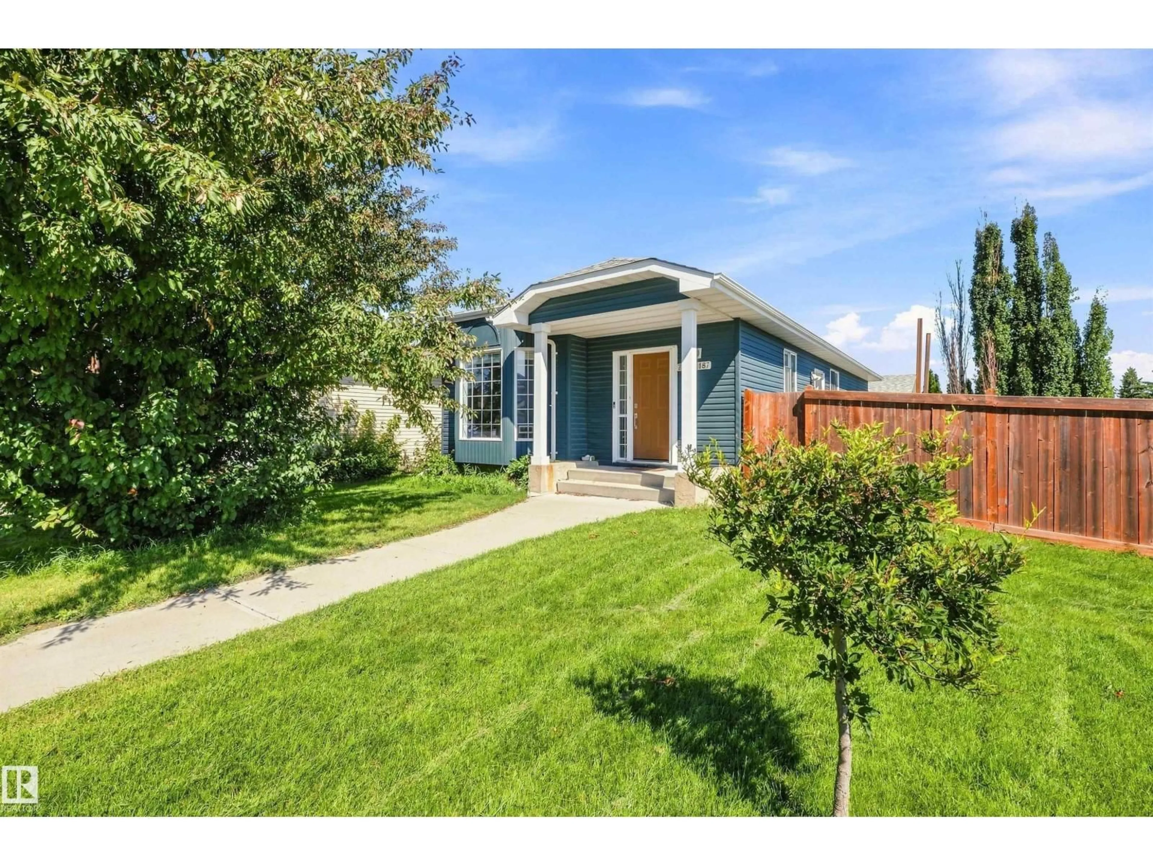 Home with vinyl exterior material, street for 7407 187 ST, Edmonton Alberta T5T5W4