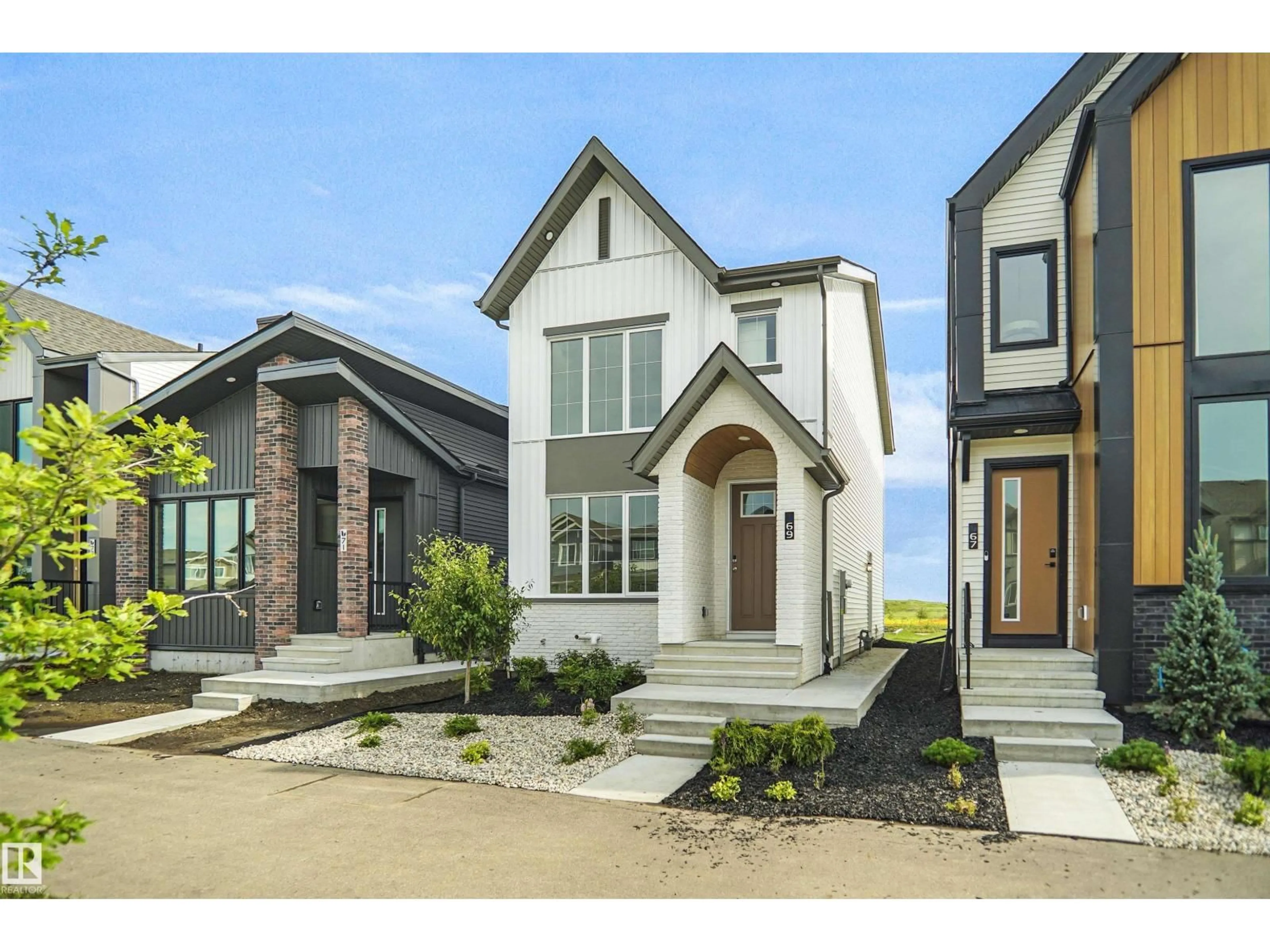 Home with brick exterior material, street for NE - 611 176 AV, Edmonton Alberta T5Y4J9