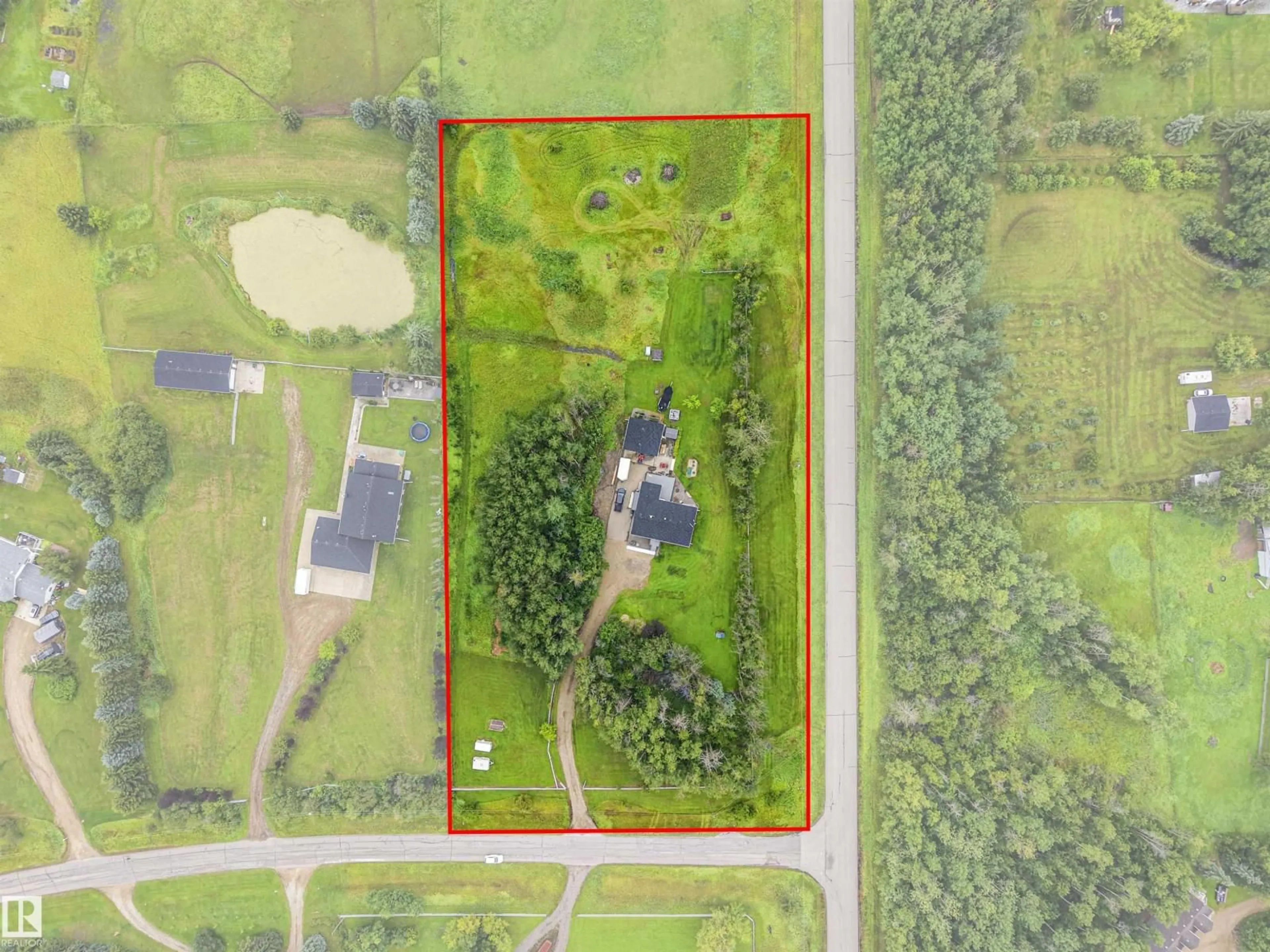A pic from outside/outdoor area/front of a property/back of a property/a pic from drone, building for 52411 - 254 RGE ROAD 214, Rural Strathcona County Alberta T8E2G8