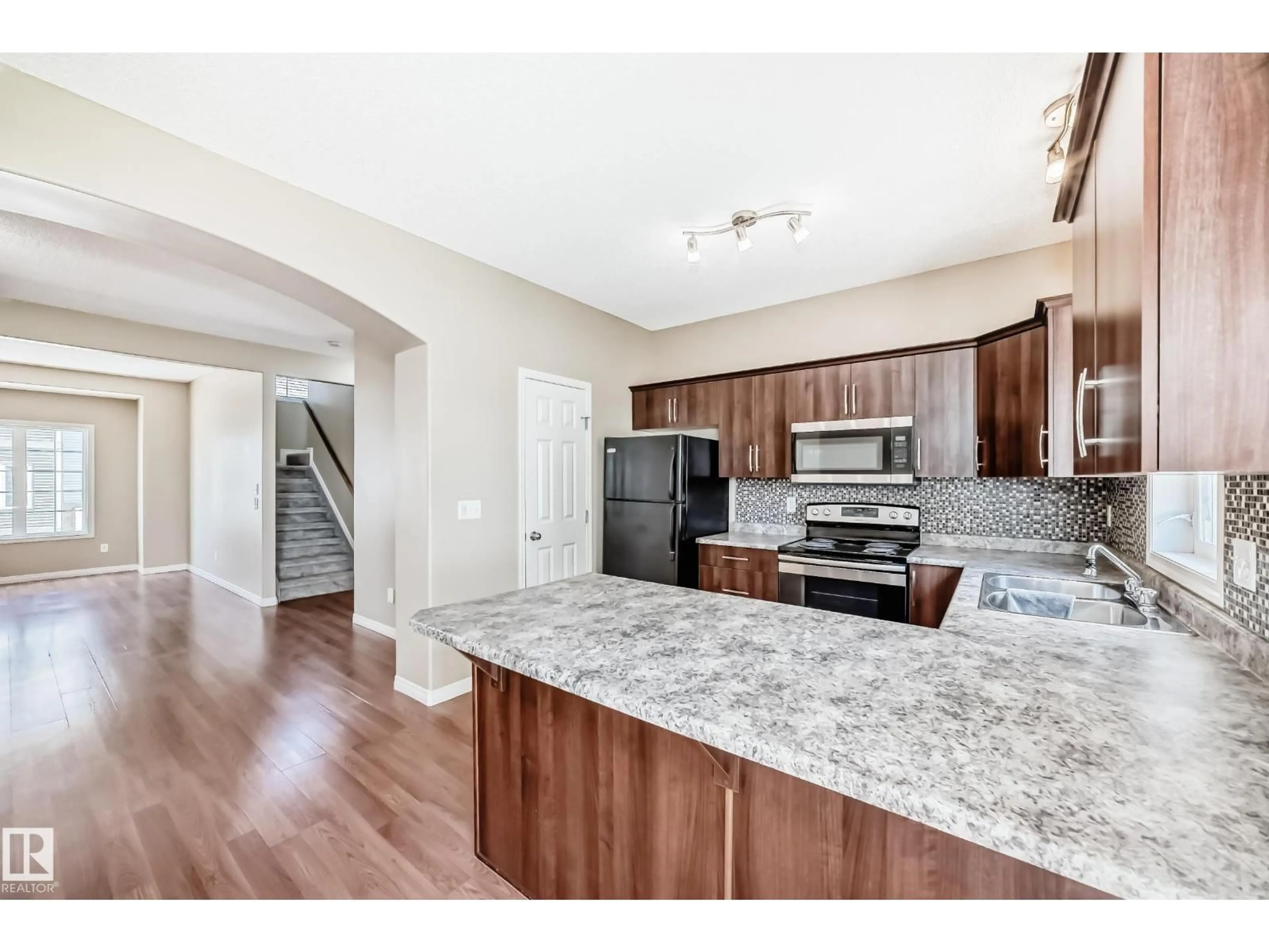 Open concept kitchen, unknown for #4 - 5102 30 AV, Beaumont Alberta T3M1V9
