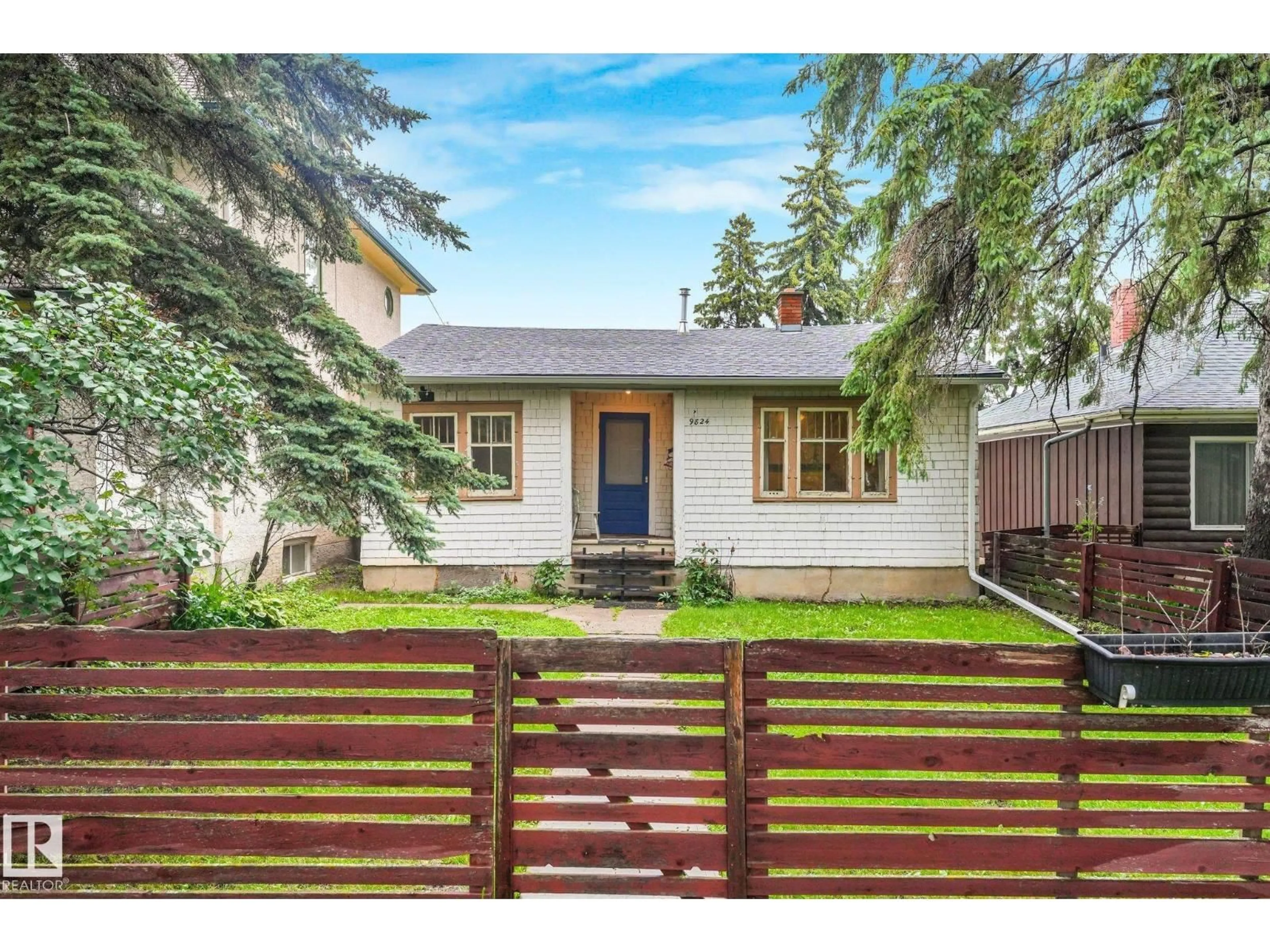 Home with vinyl exterior material, street for NW - 9824 91 AV, Edmonton Alberta T6E2T6