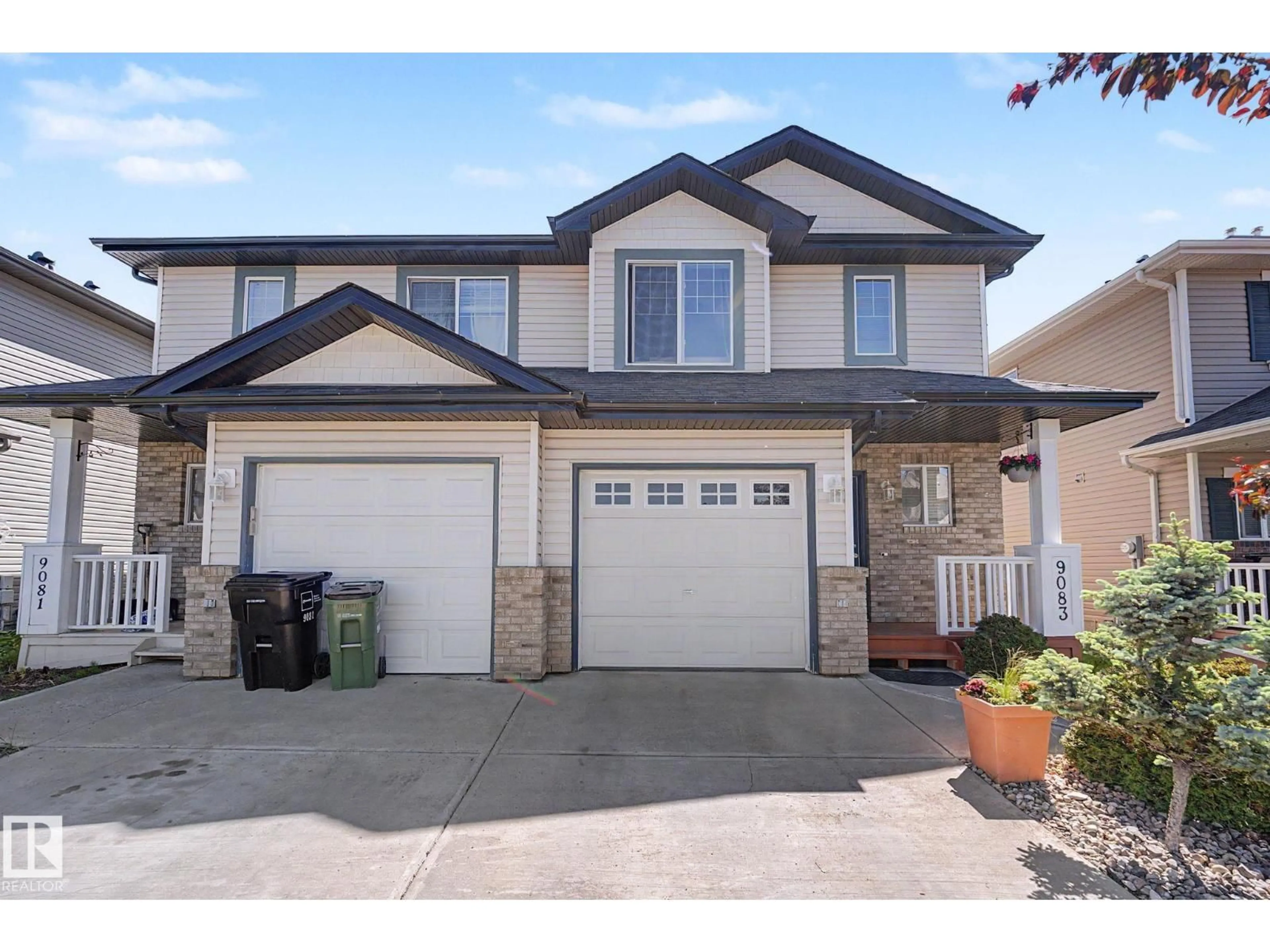 Home with vinyl exterior material, street for 9083 SCOTT CR, Edmonton Alberta T6R0E7