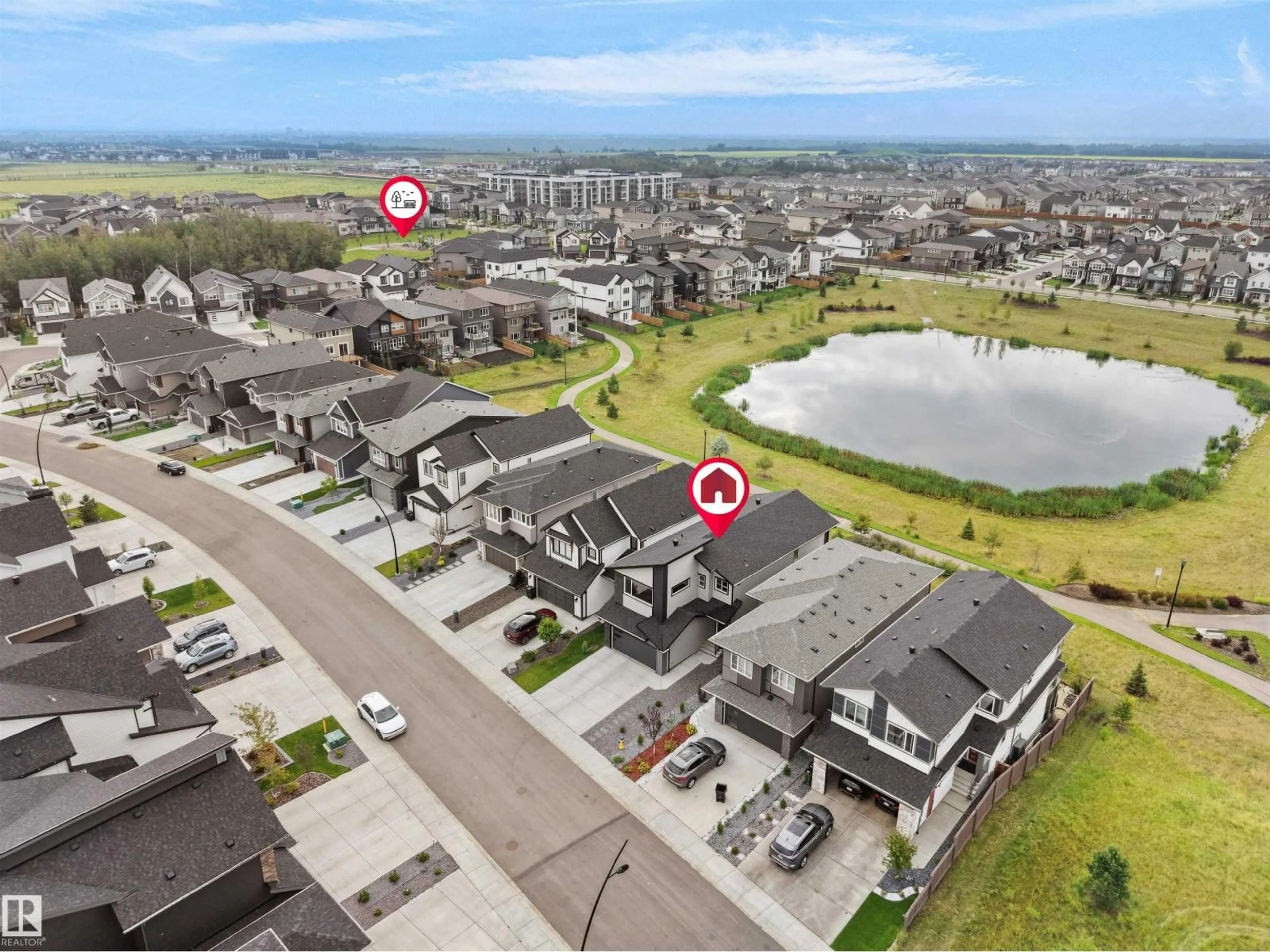 A pic from outside/outdoor area/front of a property/back of a property/a pic from drone, water/lake/river/ocean view for 20715 27 AV, Edmonton Alberta T6M1P3