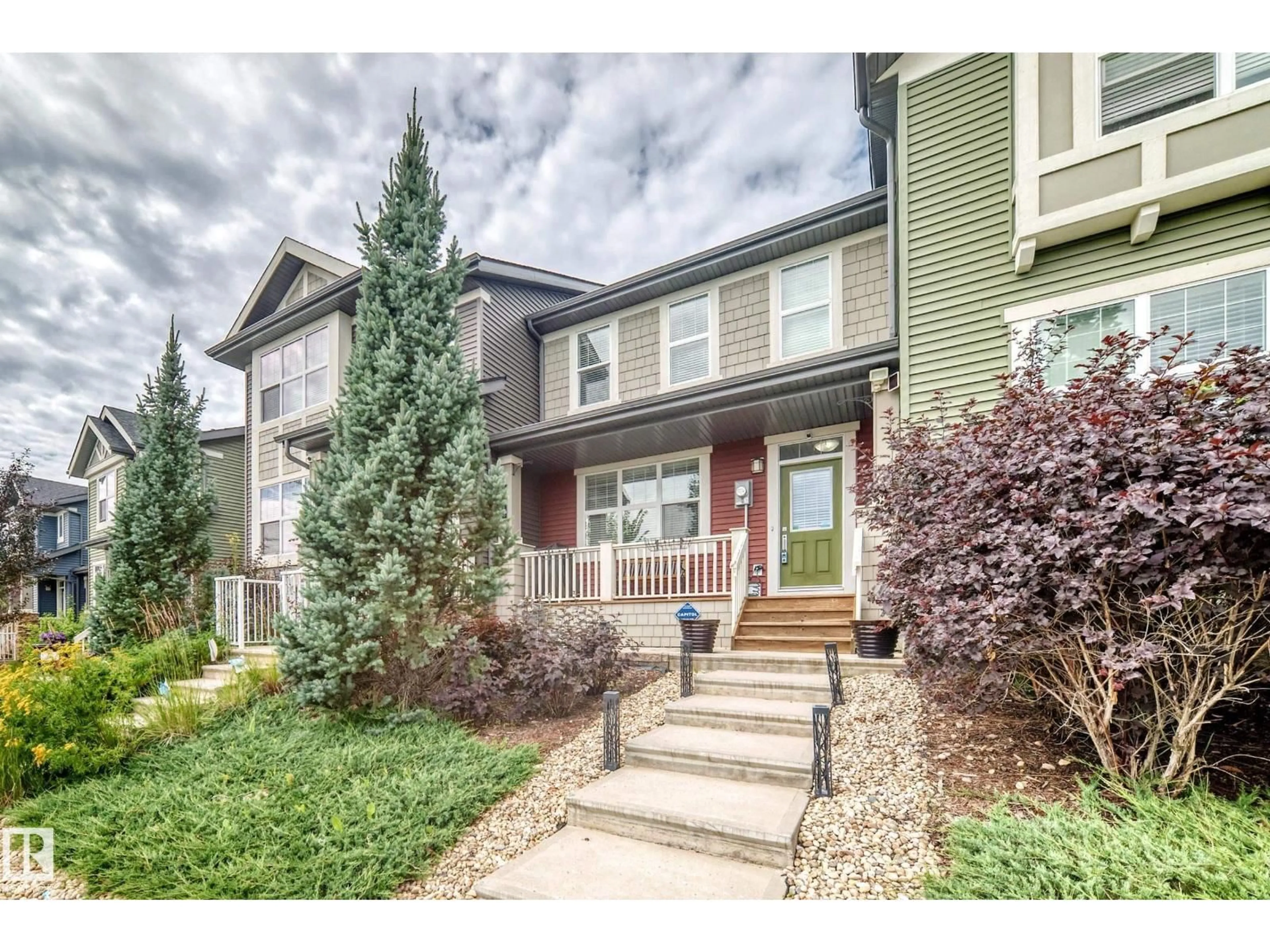 Home with vinyl exterior material, street for 6136 ROSENTHAL WY, Edmonton Alberta T5T7E3