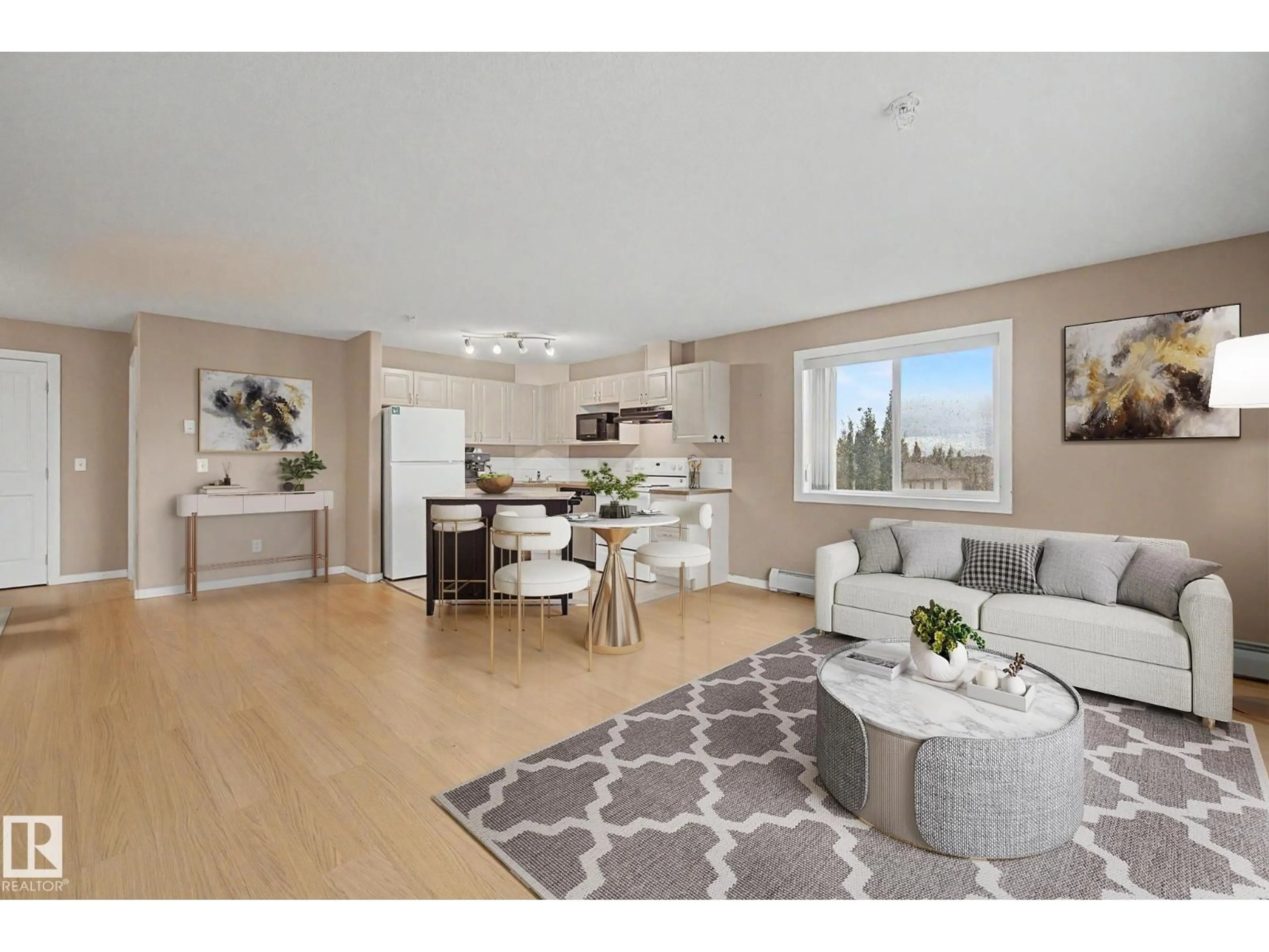 Open concept kitchen, wood/laminate floor for 323 - 240 SPRUCE RIDGE RD, Spruce Grove Alberta T7X0G5