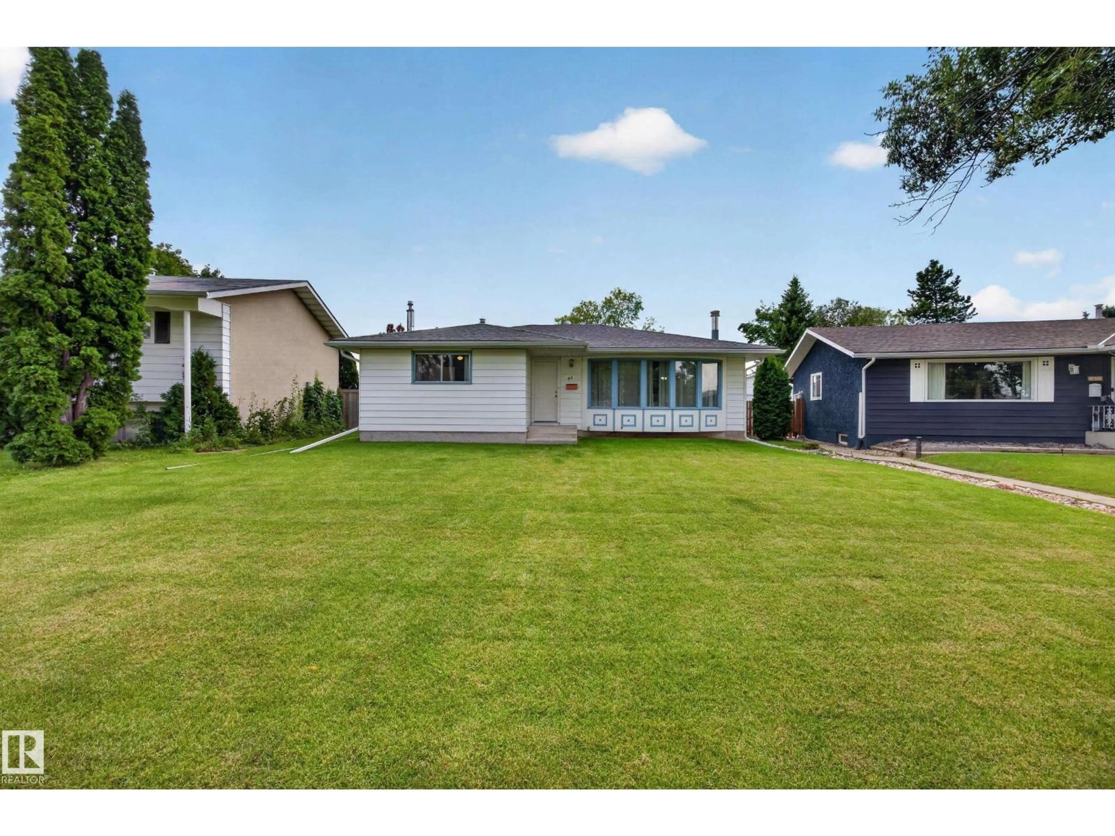 A pic from outside/outdoor area/front of a property/back of a property/a pic from drone, street for 39 APACHE CR, Leduc Alberta T9E4H8