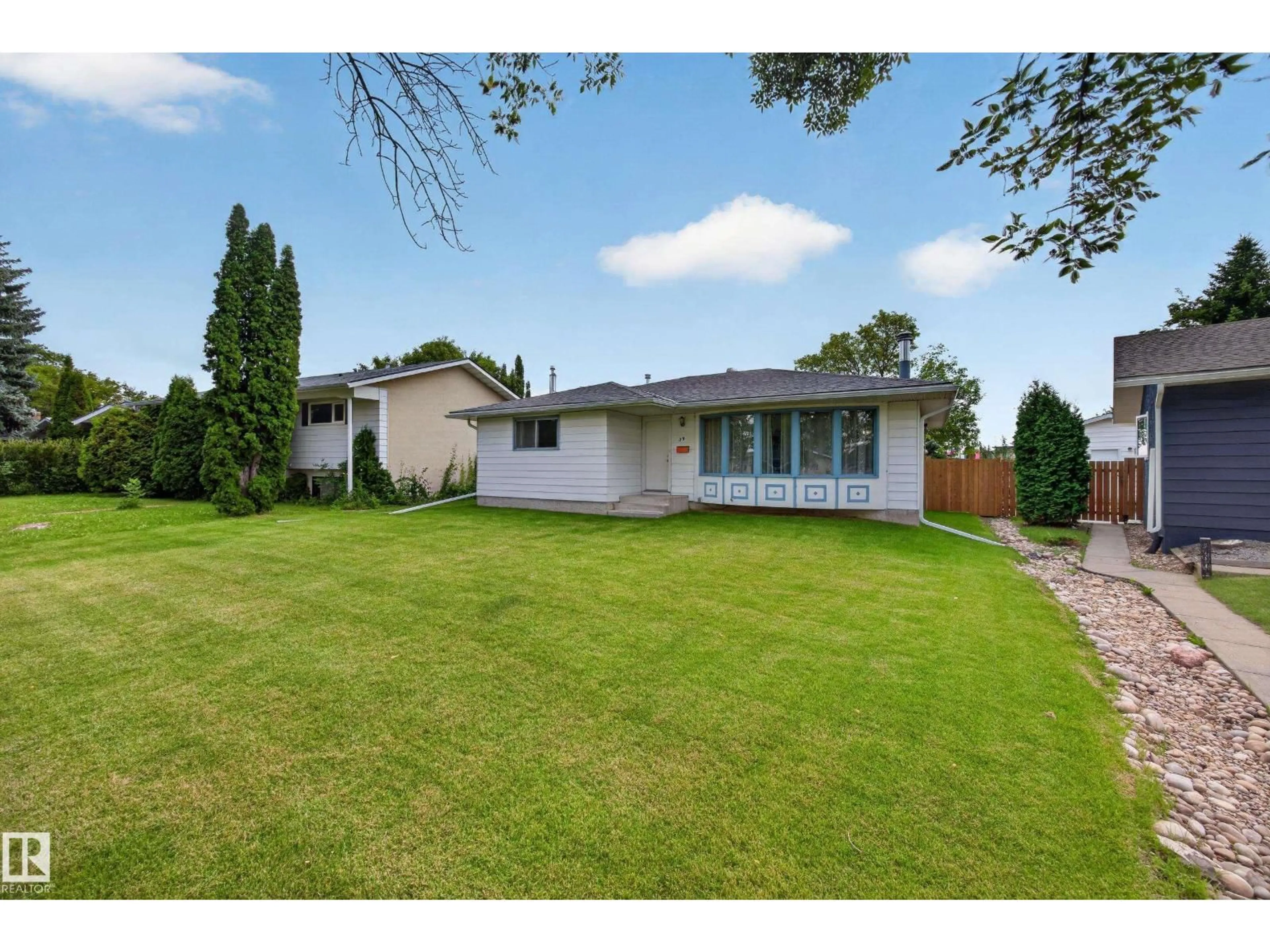 A pic from outside/outdoor area/front of a property/back of a property/a pic from drone, street for 39 APACHE CR, Leduc Alberta T9E4H8