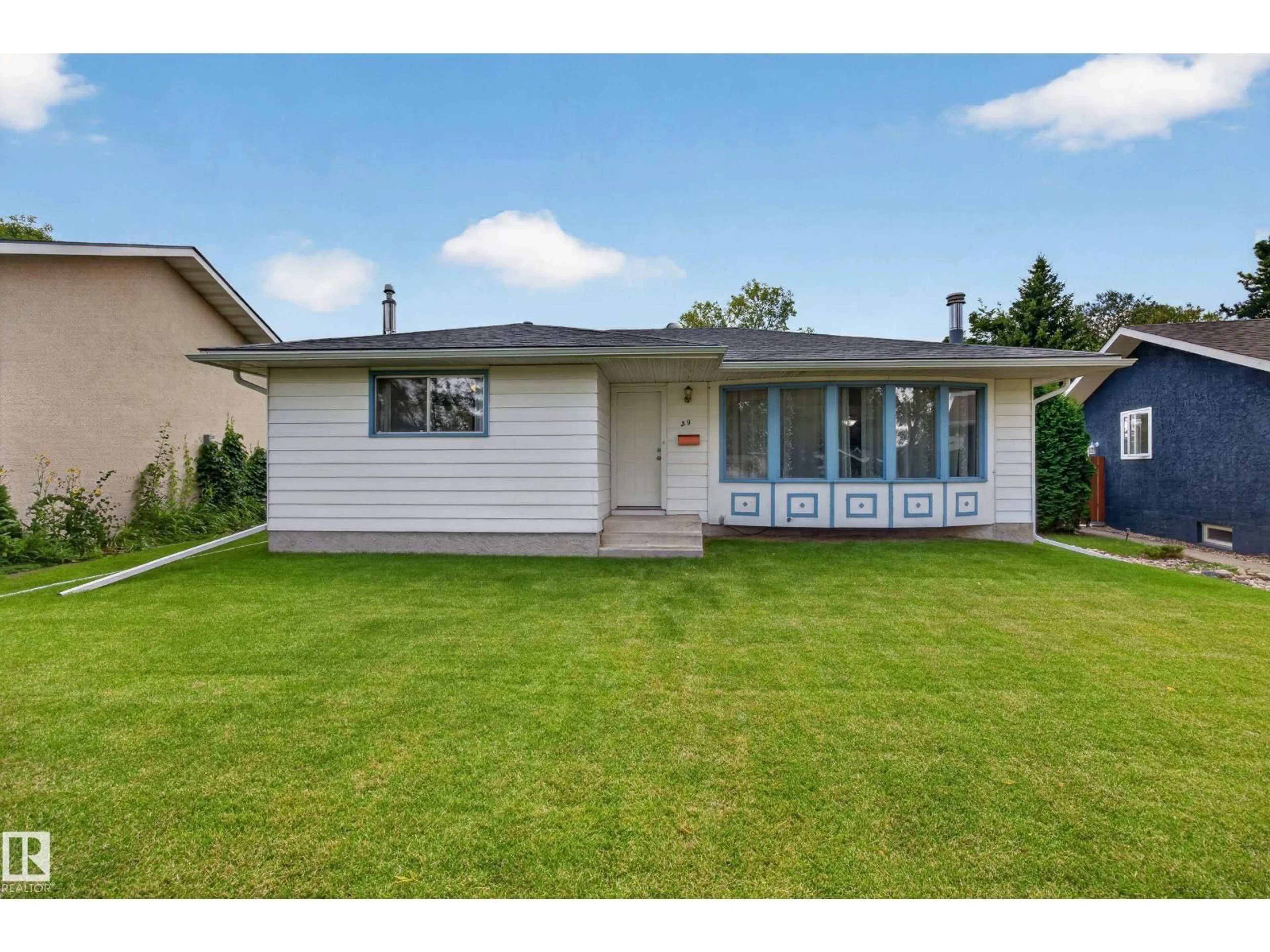 Home with vinyl exterior material, street for 39 APACHE CR, Leduc Alberta T9E4H8