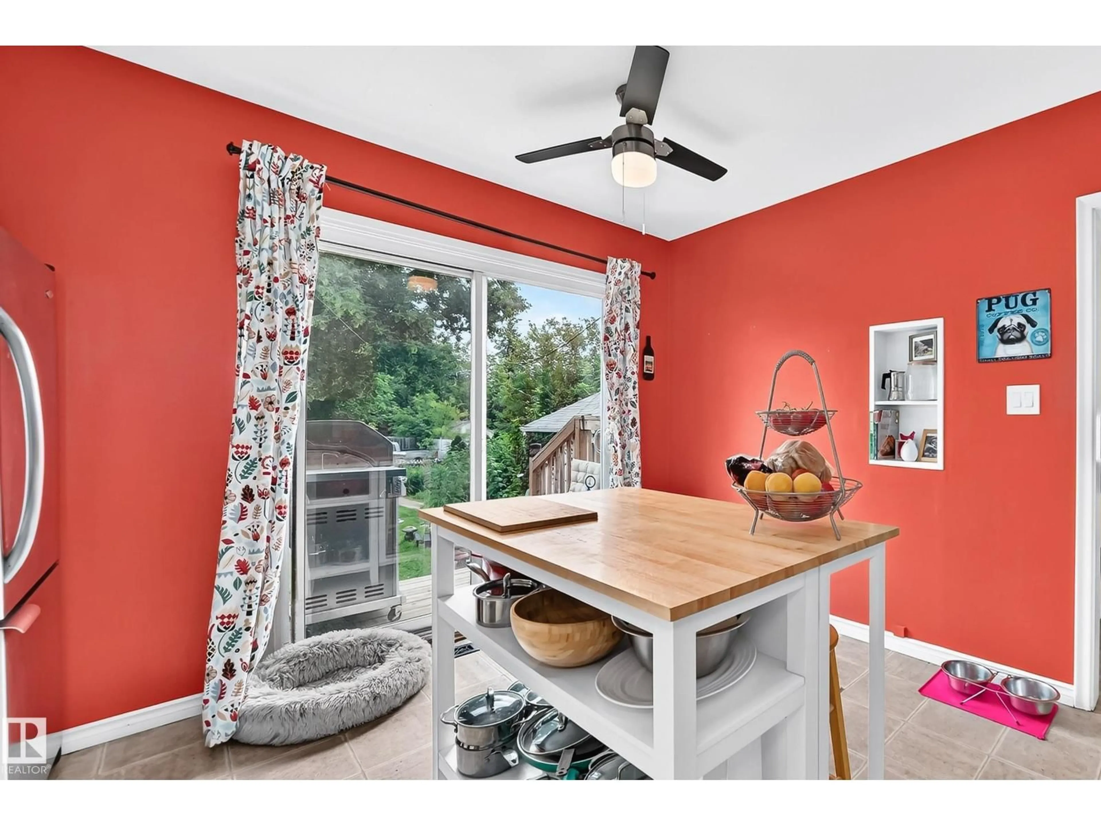 Open concept kitchen, wood/laminate floor for NW - 12405 126 ST, Edmonton Alberta T5L0X2
