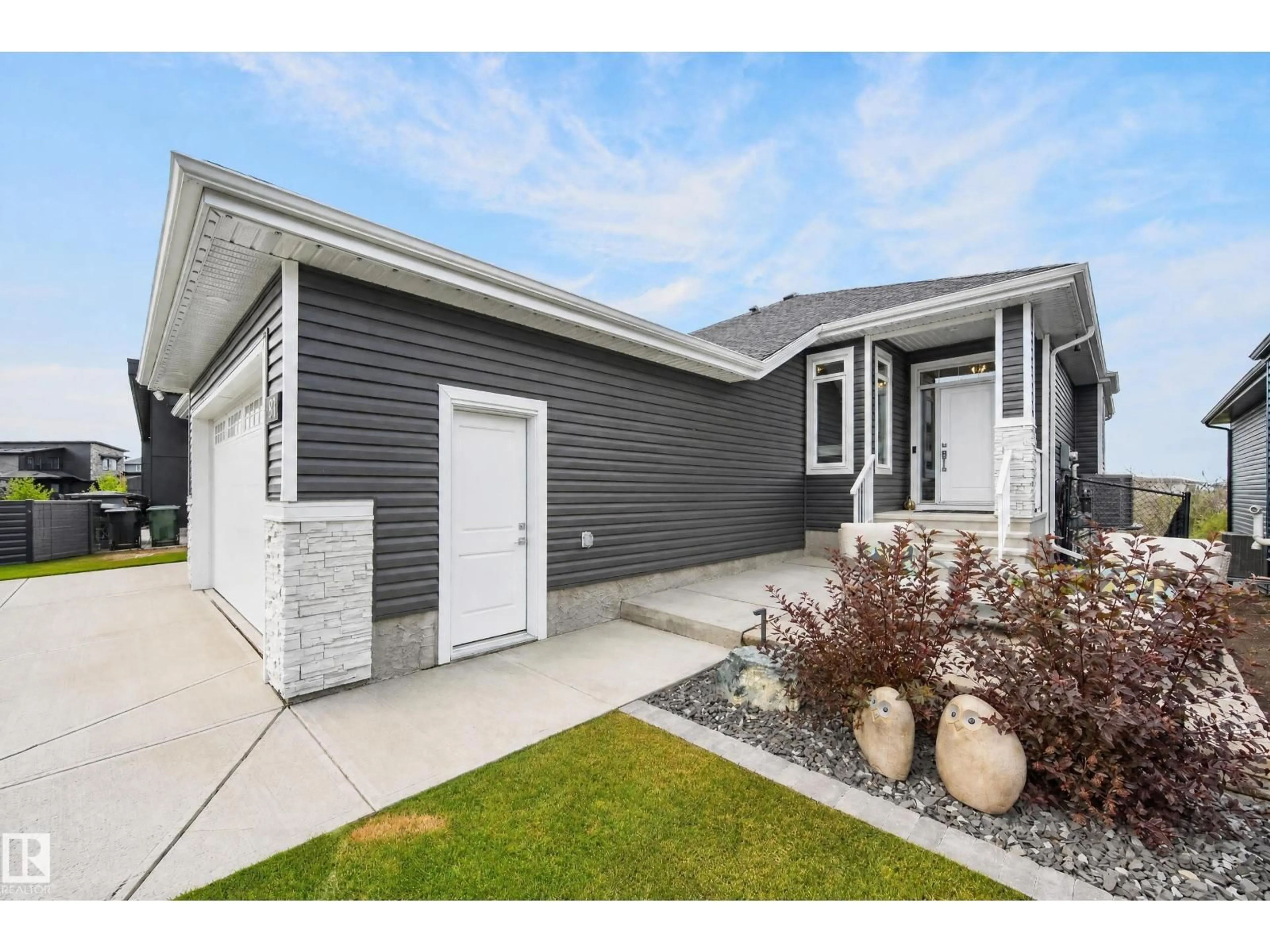 Home with vinyl exterior material, street for 91 HARVEST CR, Ardrossan Alberta T8E0A8