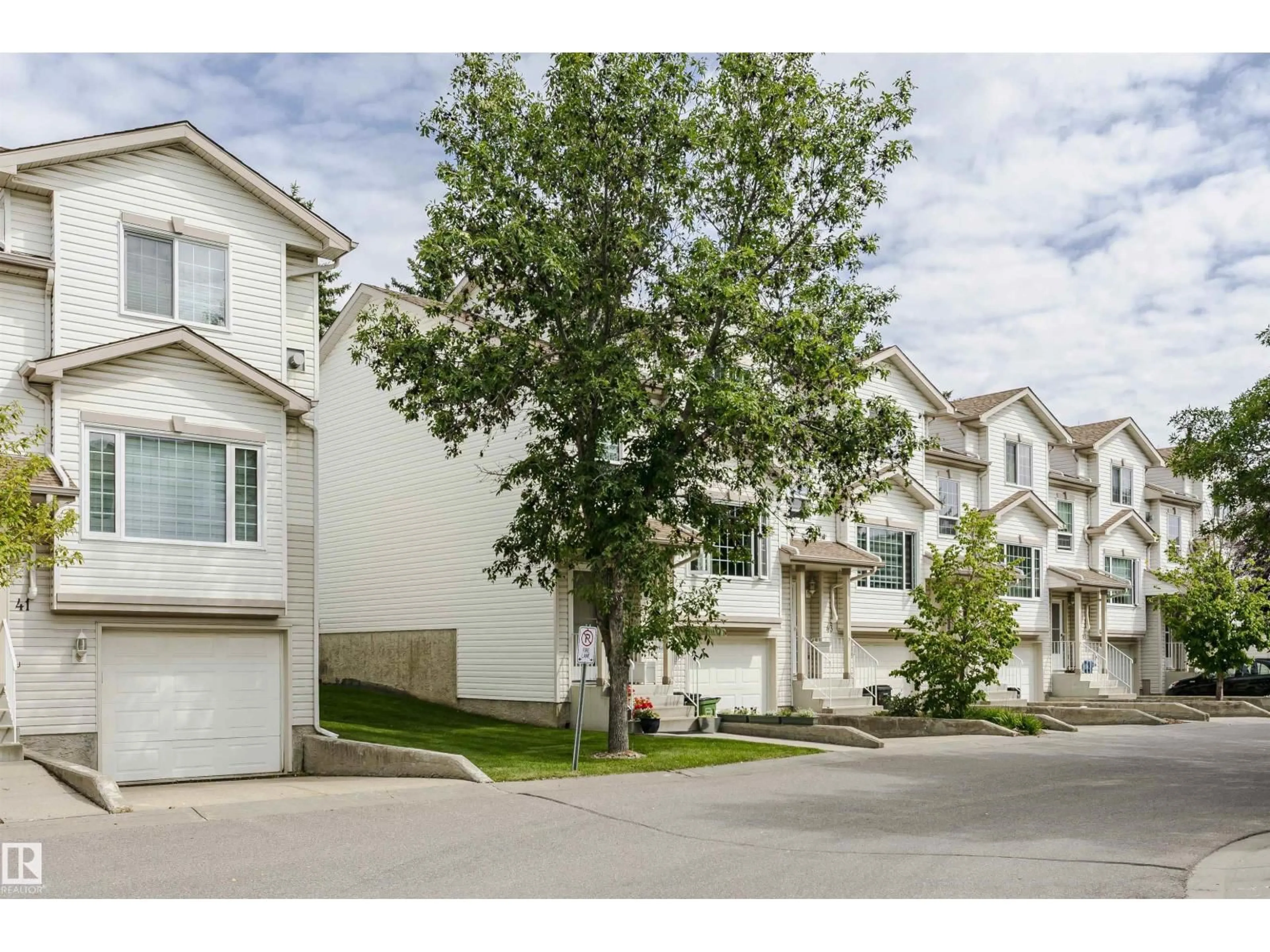 A pic from outside/outdoor area/front of a property/back of a property/a pic from drone, street for #42 - 9630 176 ST, Edmonton Alberta T5T6E1