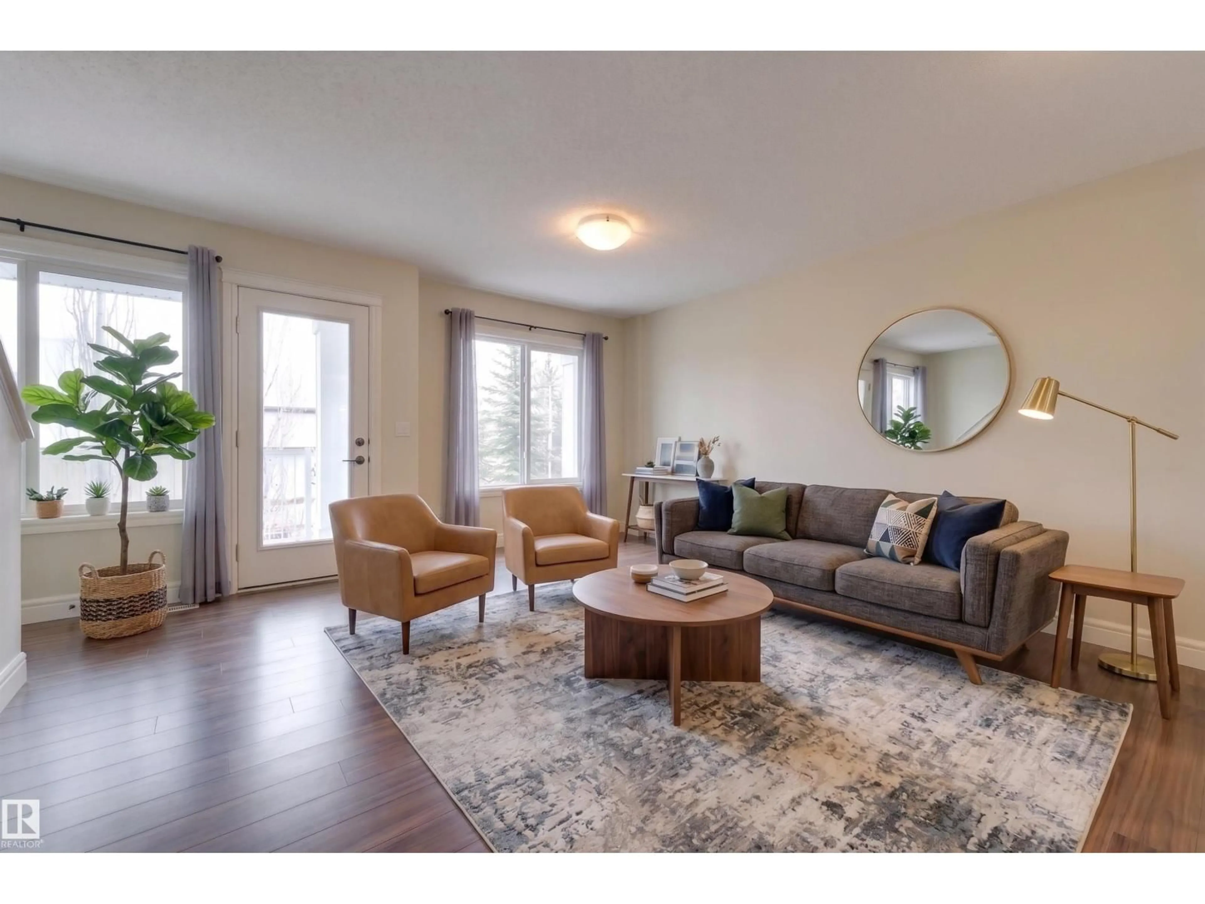 Living room with furniture, wood/laminate floor for #57 - 330 BULYEA RD, Edmonton Alberta T6R0W8