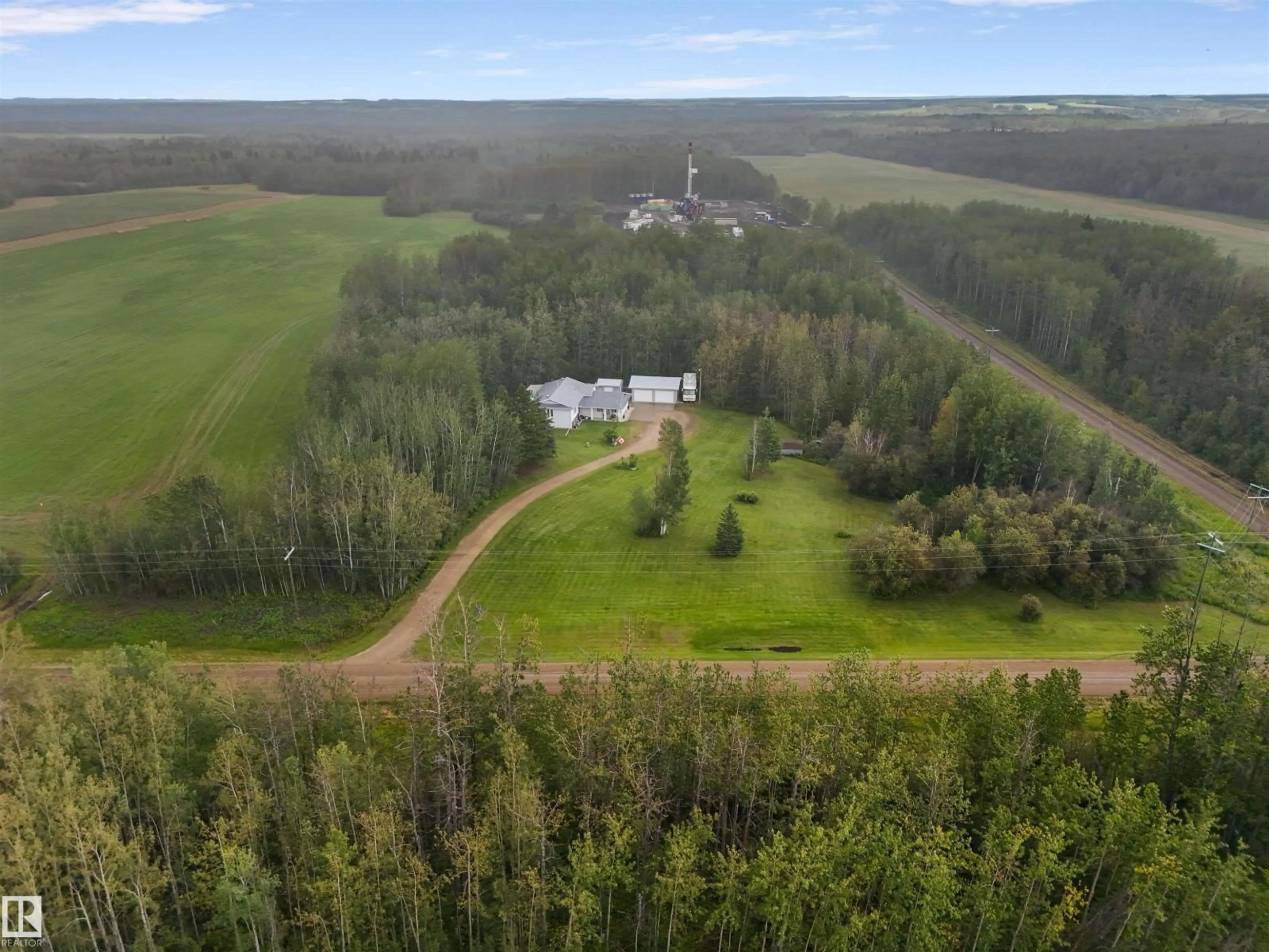 A pic from outside/outdoor area/front of a property/back of a property/a pic from drone, forest/trees view for 49419 RGE ROAD 72, Rural Brazeau County Alberta T7A1R9