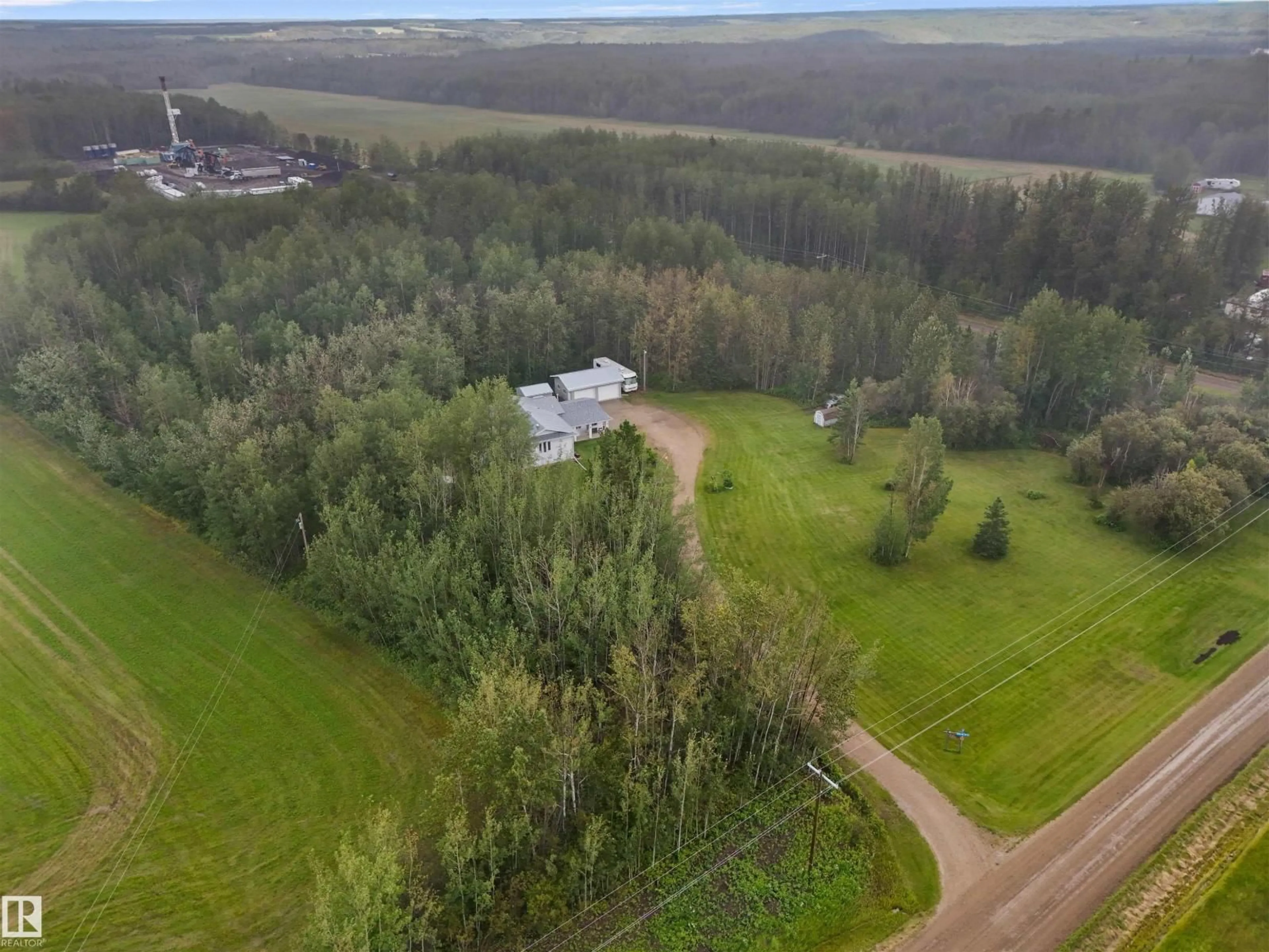 A pic from outside/outdoor area/front of a property/back of a property/a pic from drone, forest/trees view for 49419 RGE ROAD 72, Rural Brazeau County Alberta T7A1R9